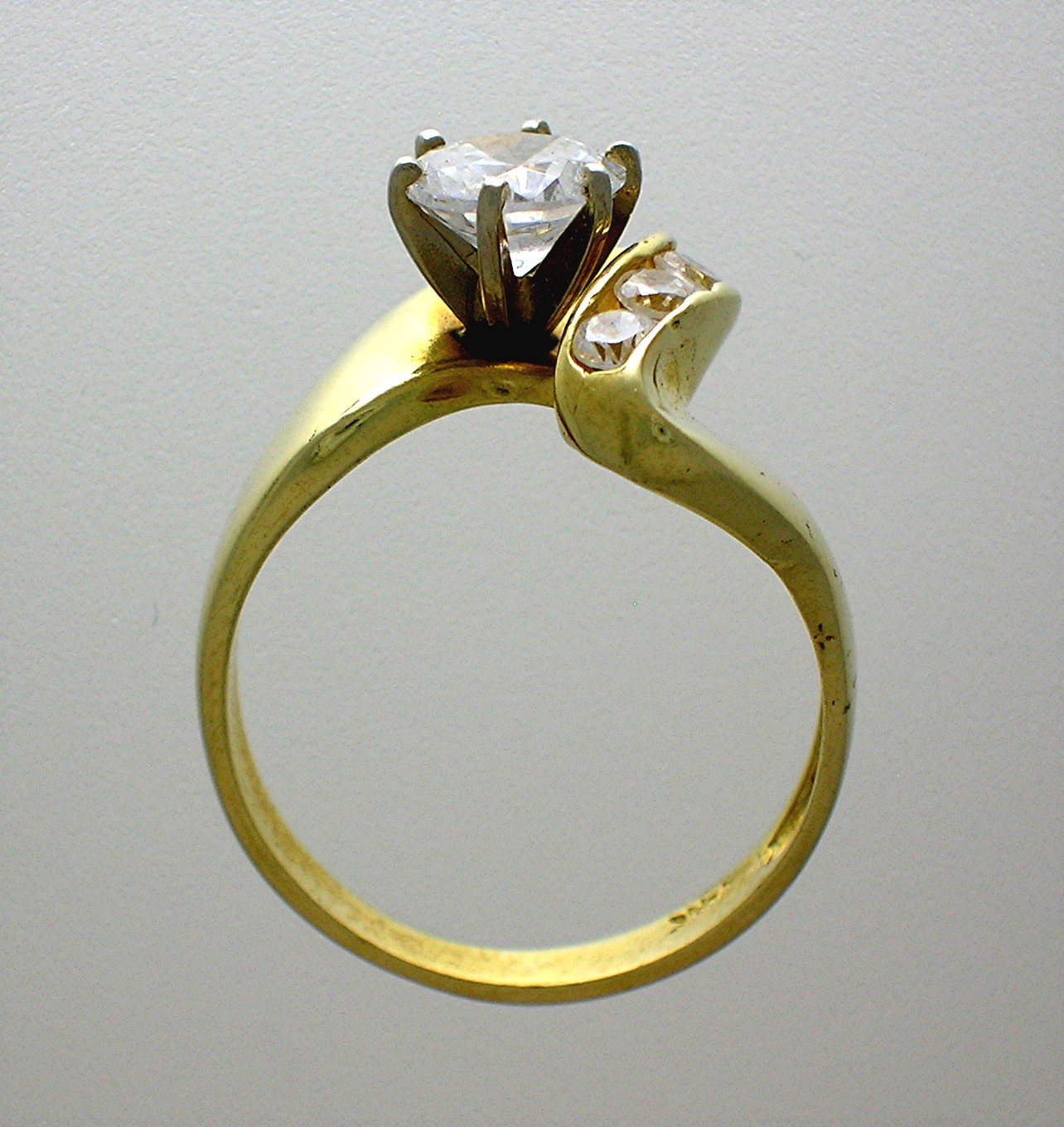 14 K Gold 1 1/4 round Channel Set CZ's Ring
