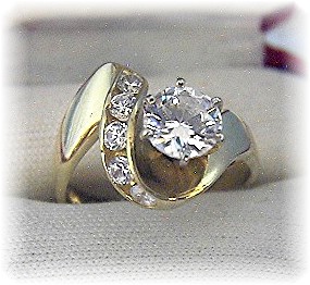 14 K Gold 1 1/4 round Channel Set CZ's Ring