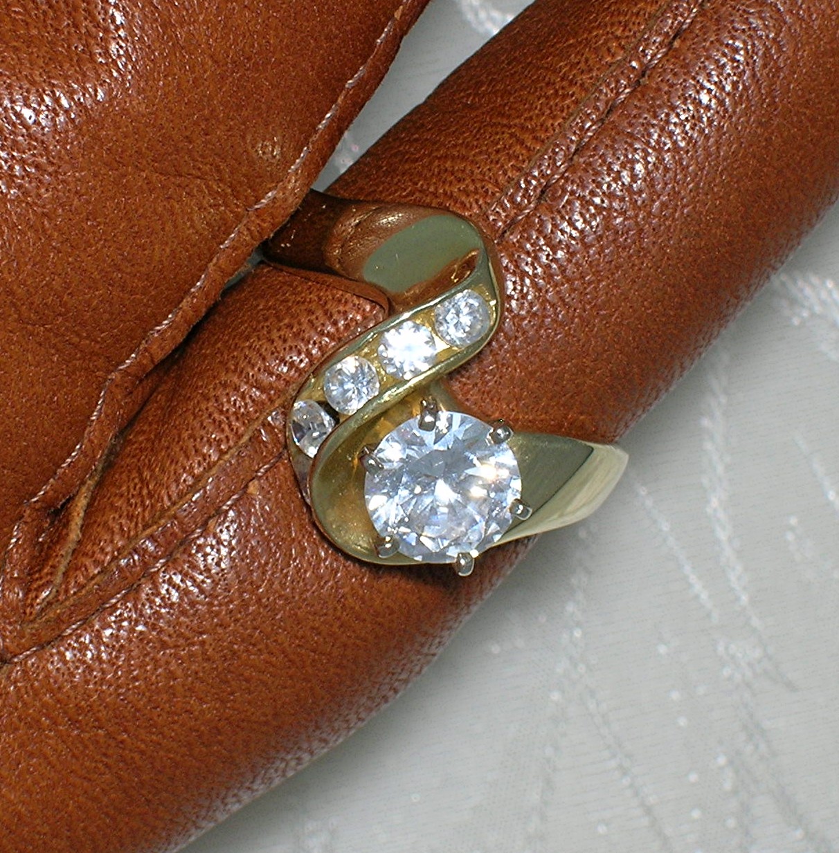 14 K Gold 1 1/4 round Channel Set CZ's Ring