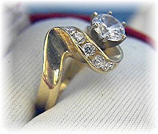 14 K Gold 1 1/4 round Channel Set CZ's Ring