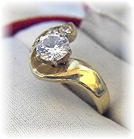14 K Gold 1 1/4 round Channel Set CZ's Ring