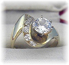 14 K Gold 1 1/4 round Channel Set CZ's Ring