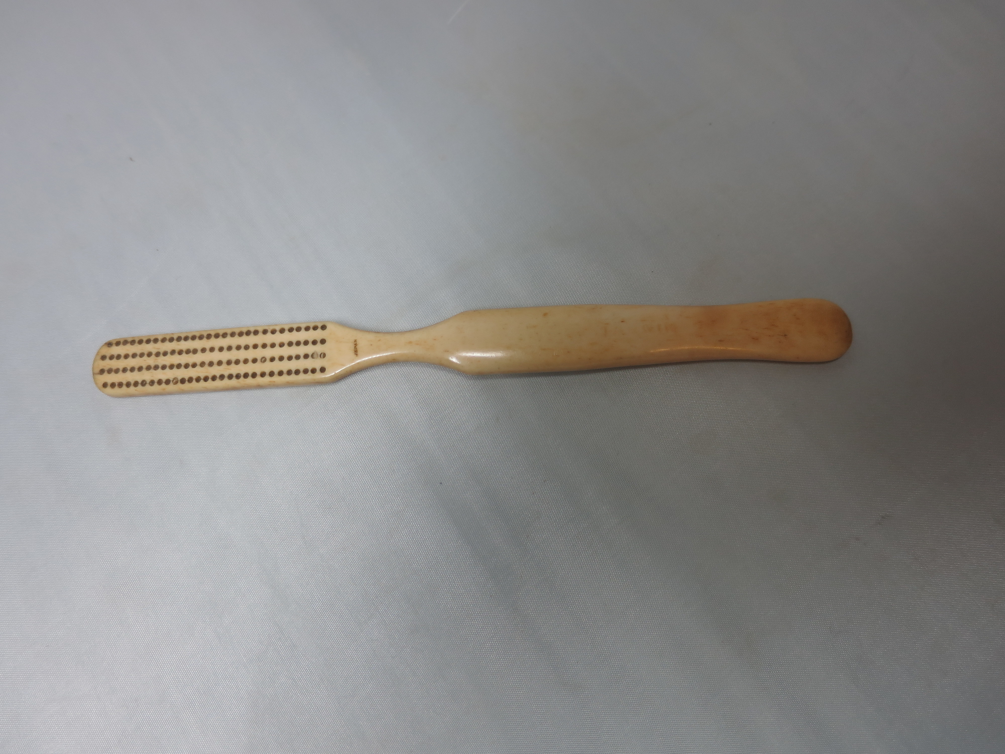 Bone Toothbrush marked Japan and Larkin