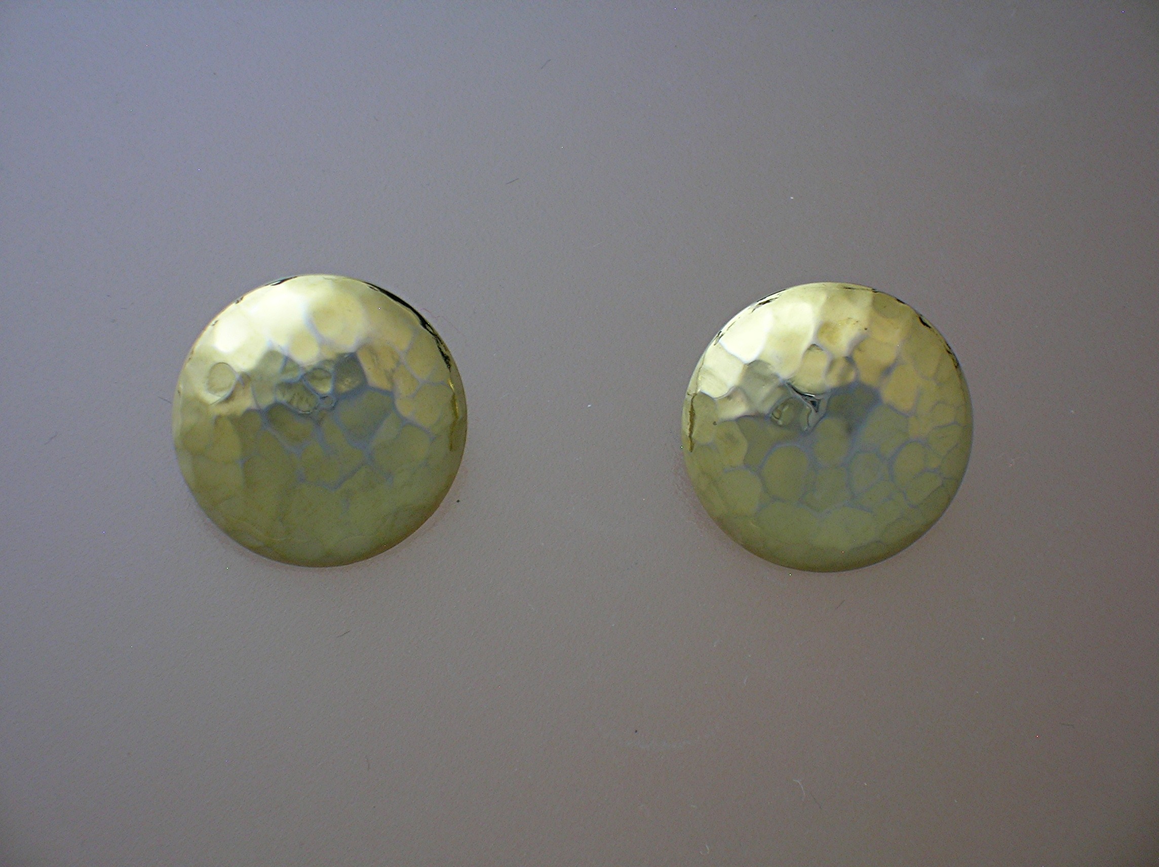 Pair Of Dimpled Round Goldtone Pierced Earrings