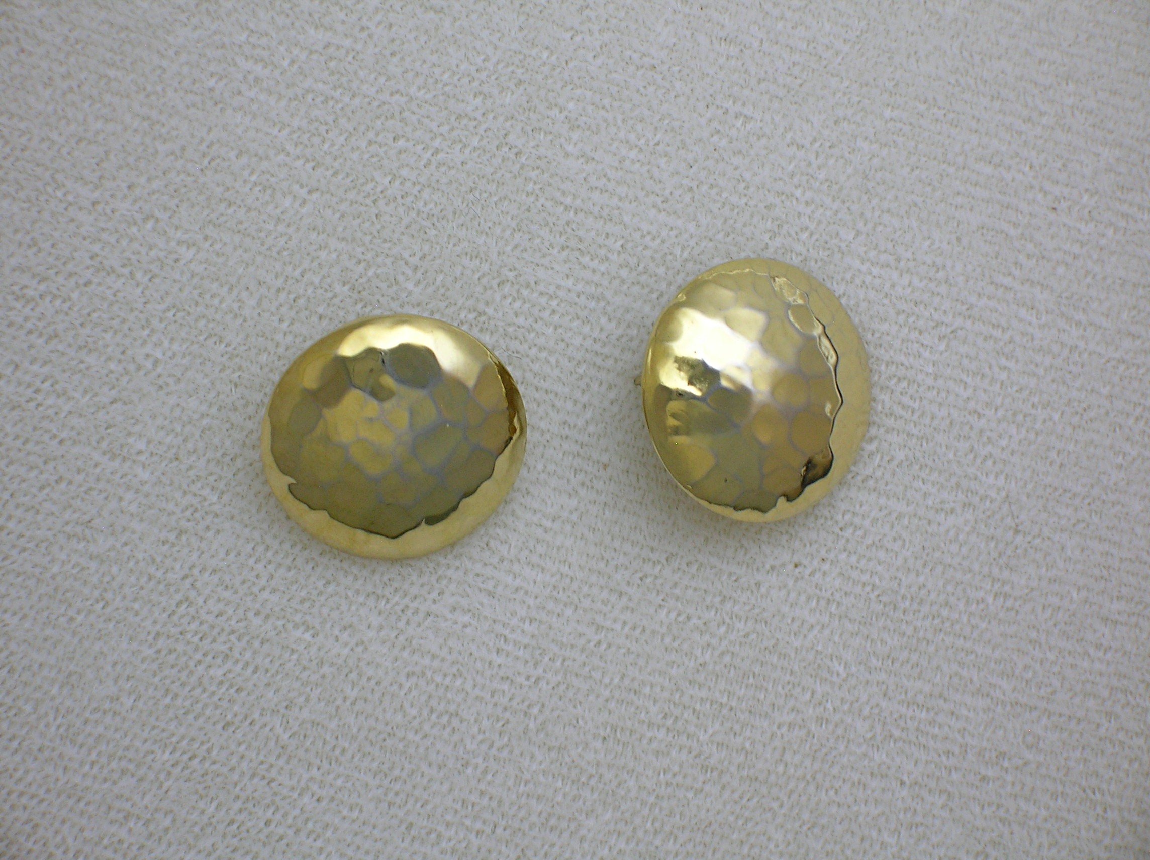 Pair Of Dimpled Round Goldtone Pierced Earrings