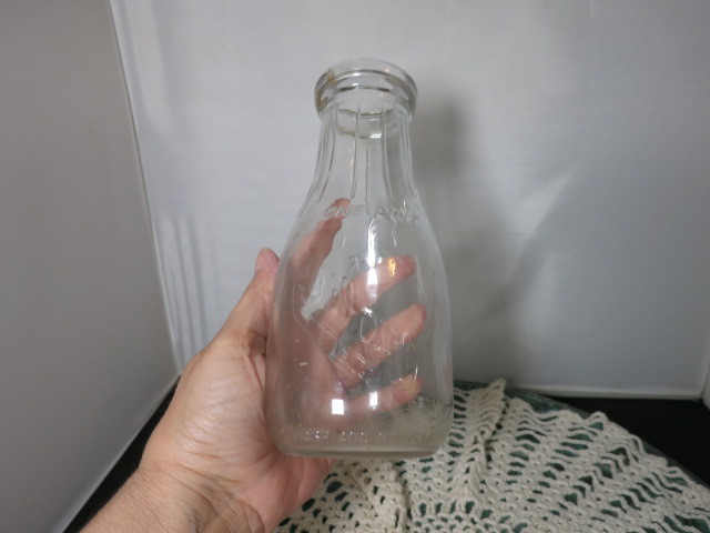 Weaver Quality Blue Ribbon milk bottle on pint