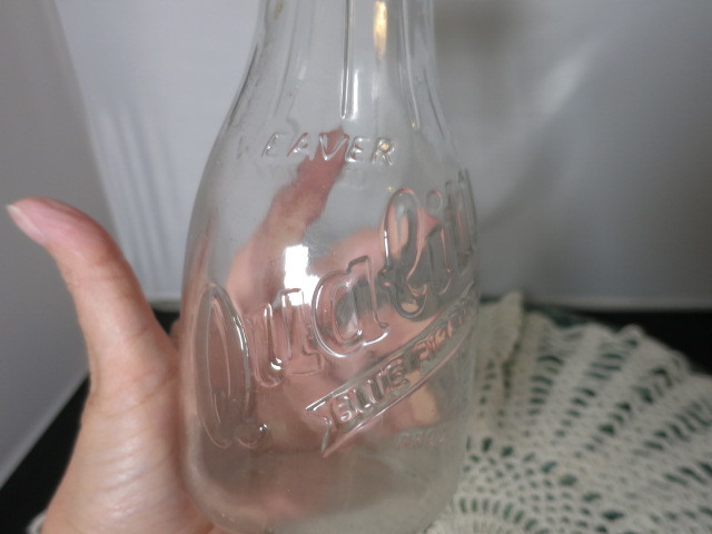 Weaver Quality Blue Ribbon milk bottle on pint