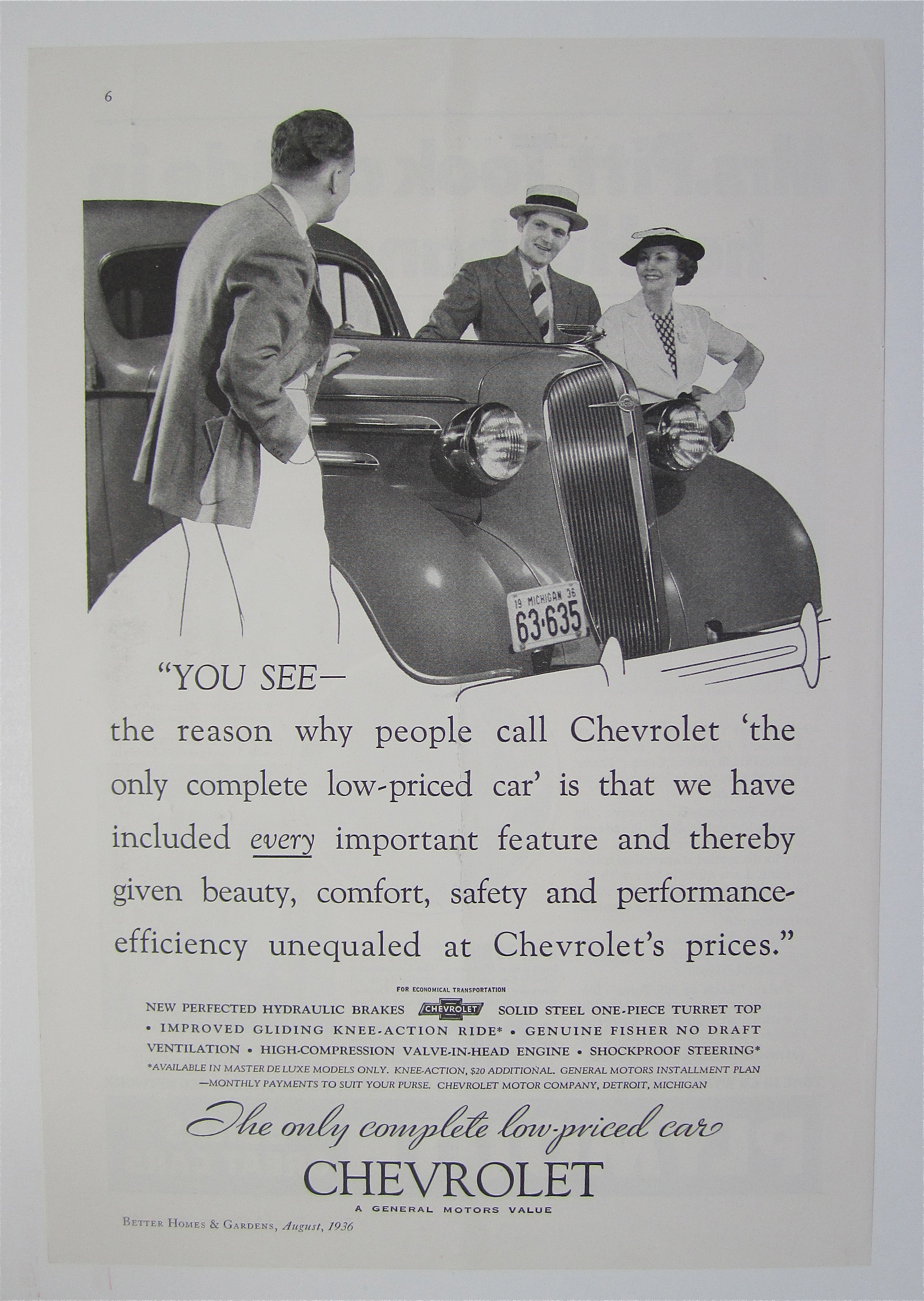 1936 Chevrolet with Man Talking with a Couple