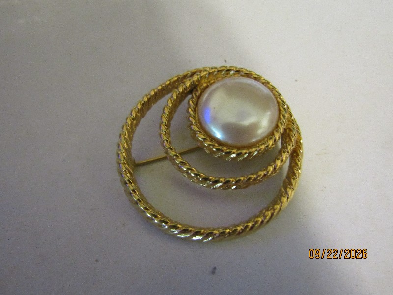 Vintage Monet Gold-Tone Textured Spiral Brooch with Faux Pearl Center