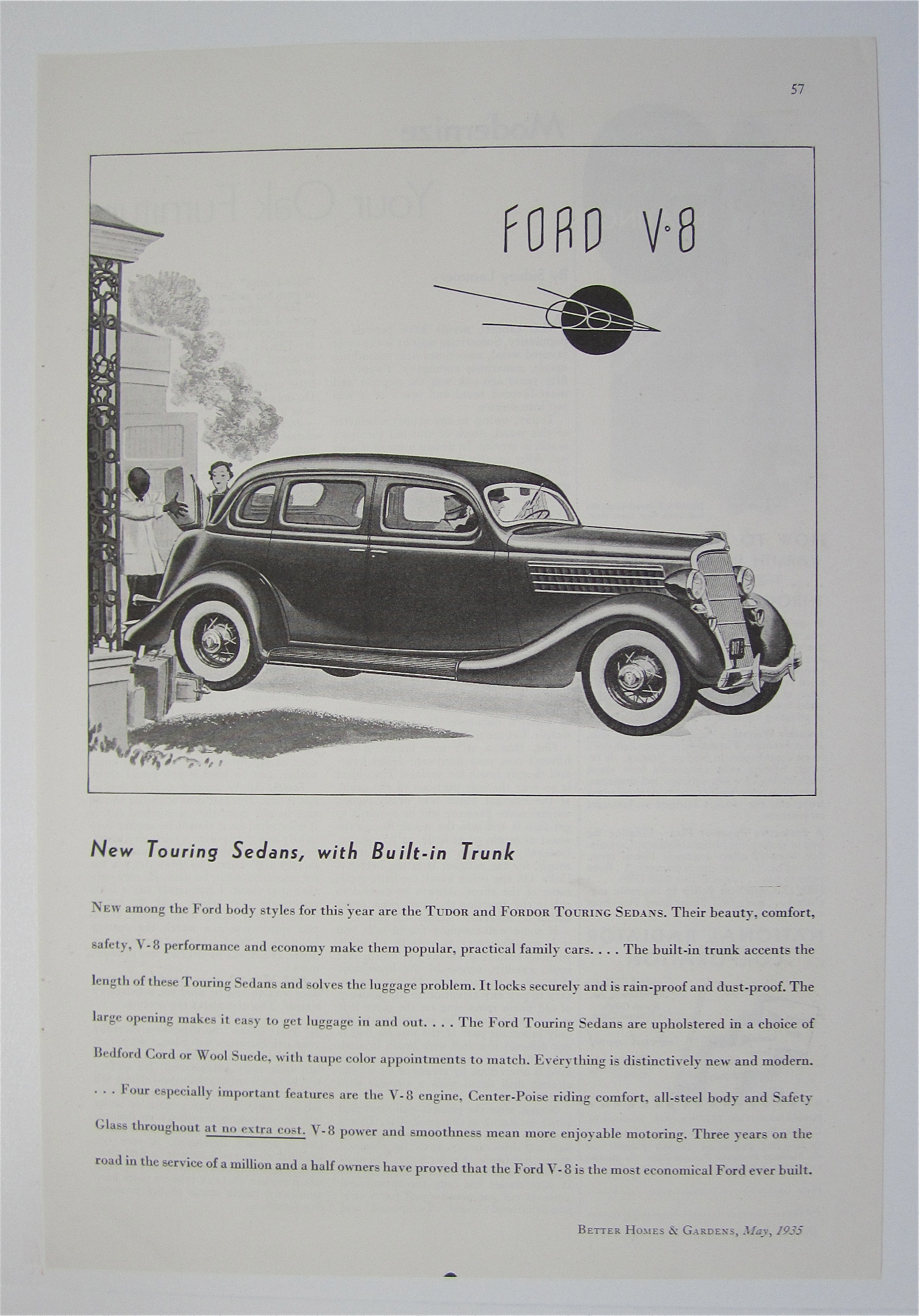 1935 Ford V-8 with Couple Driving In Car