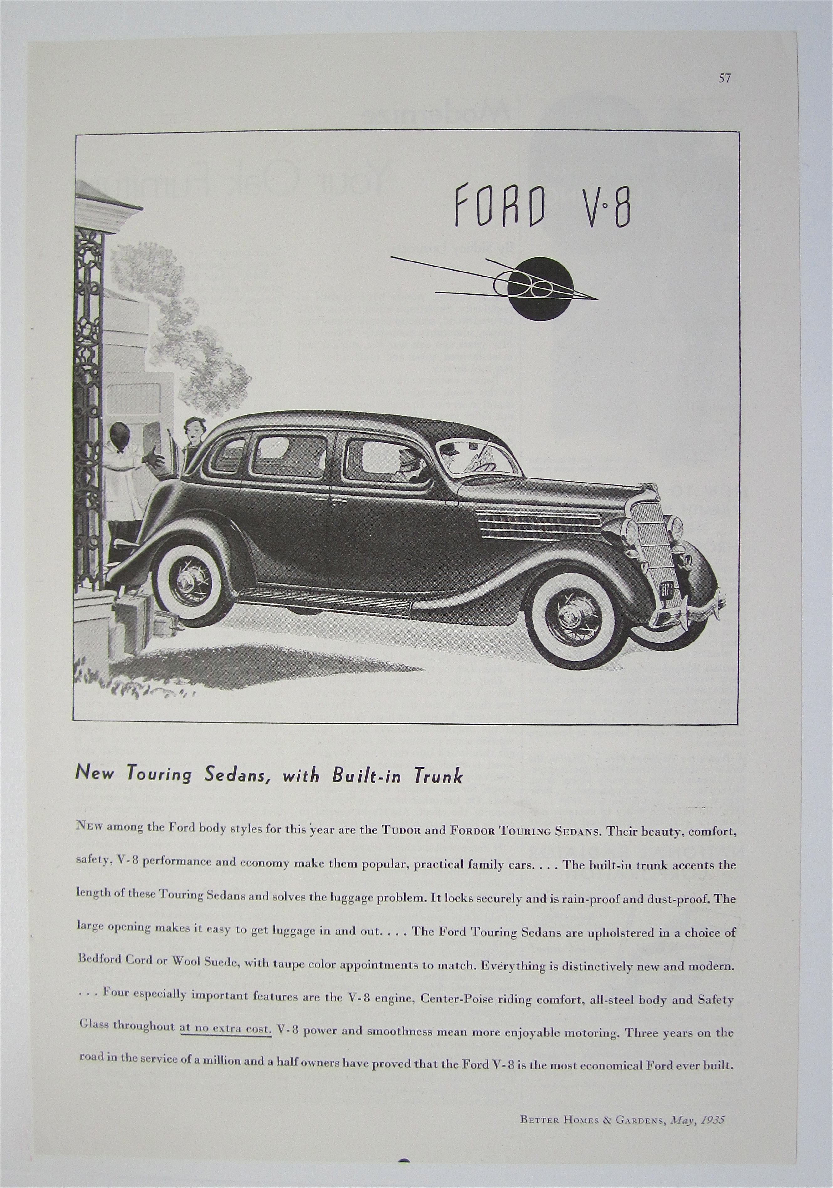 1935 Ford V-8 with Couple Driving In Car
