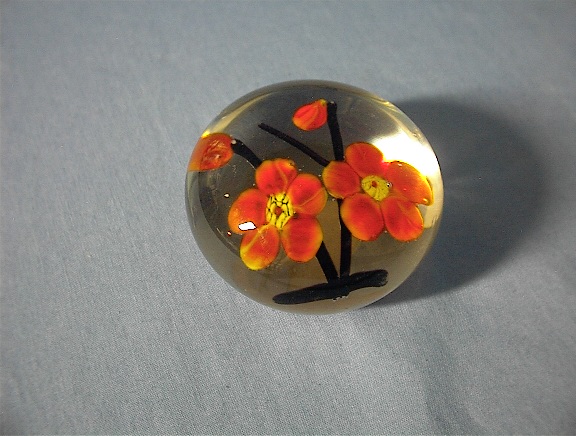 Beautiful Glass Paperweight with Red Flowers.