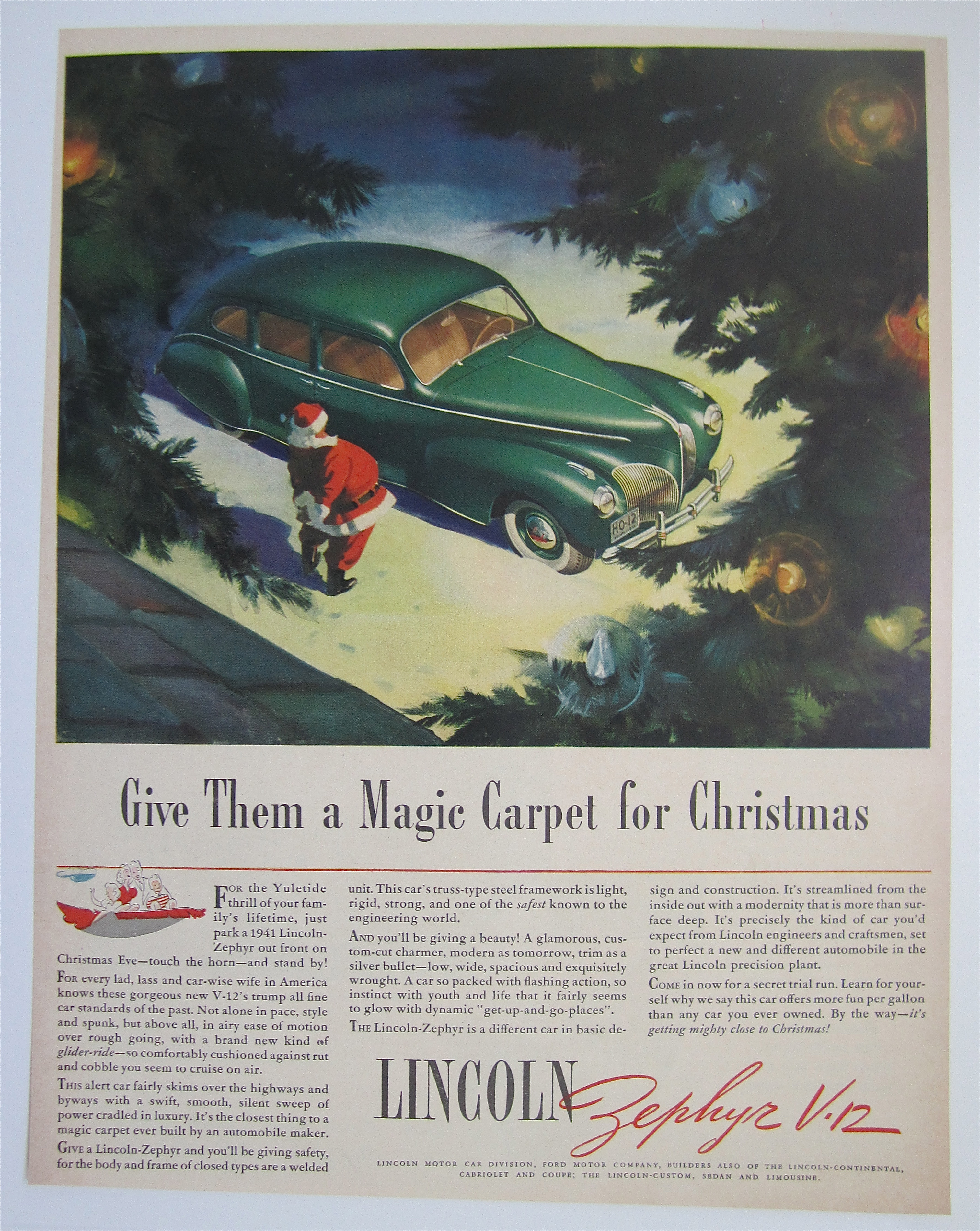 1940 Lincoln Zephyr V-12 with Santa Looking At Car