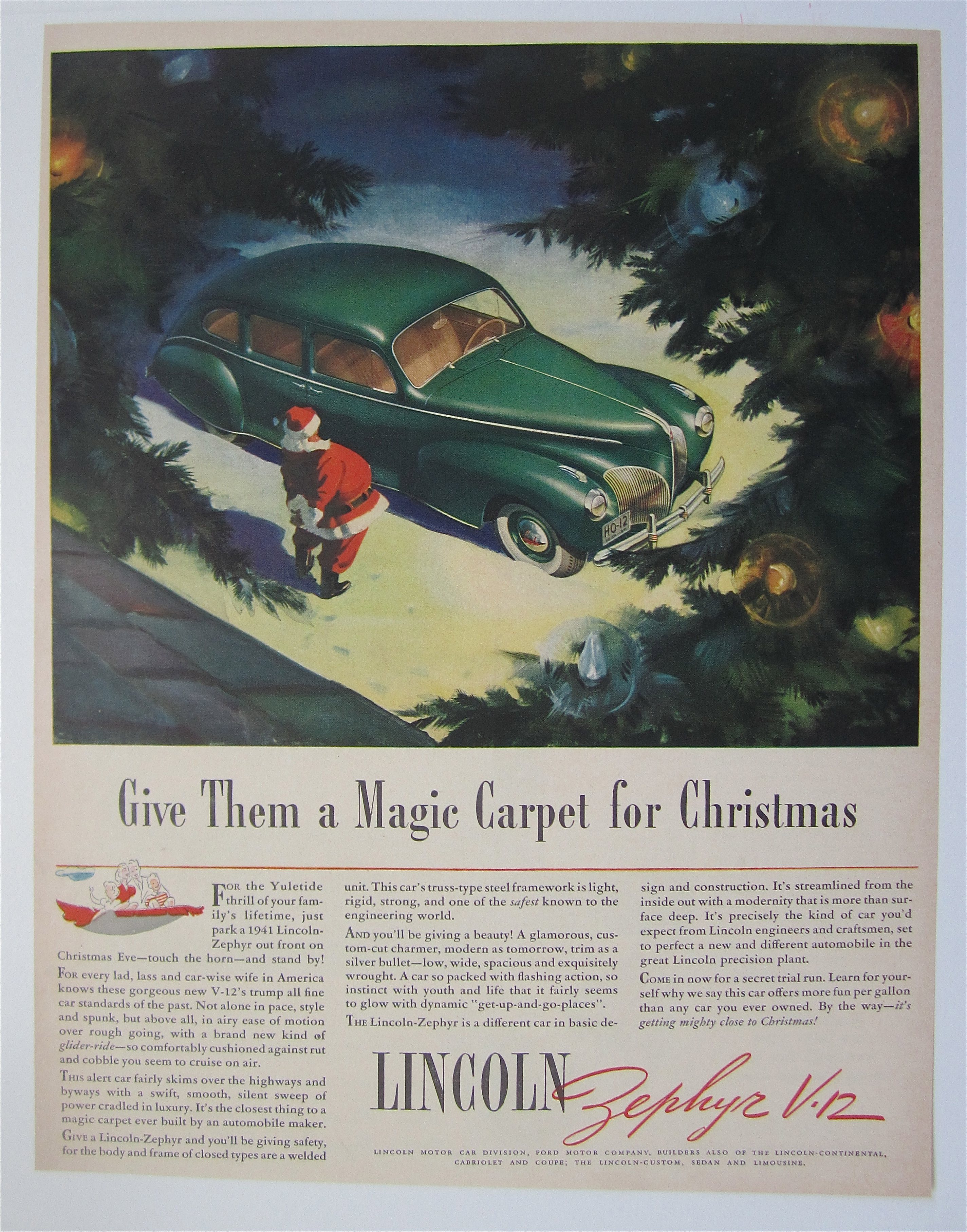 1940 Lincoln Zephyr V-12 with Santa Looking At Car