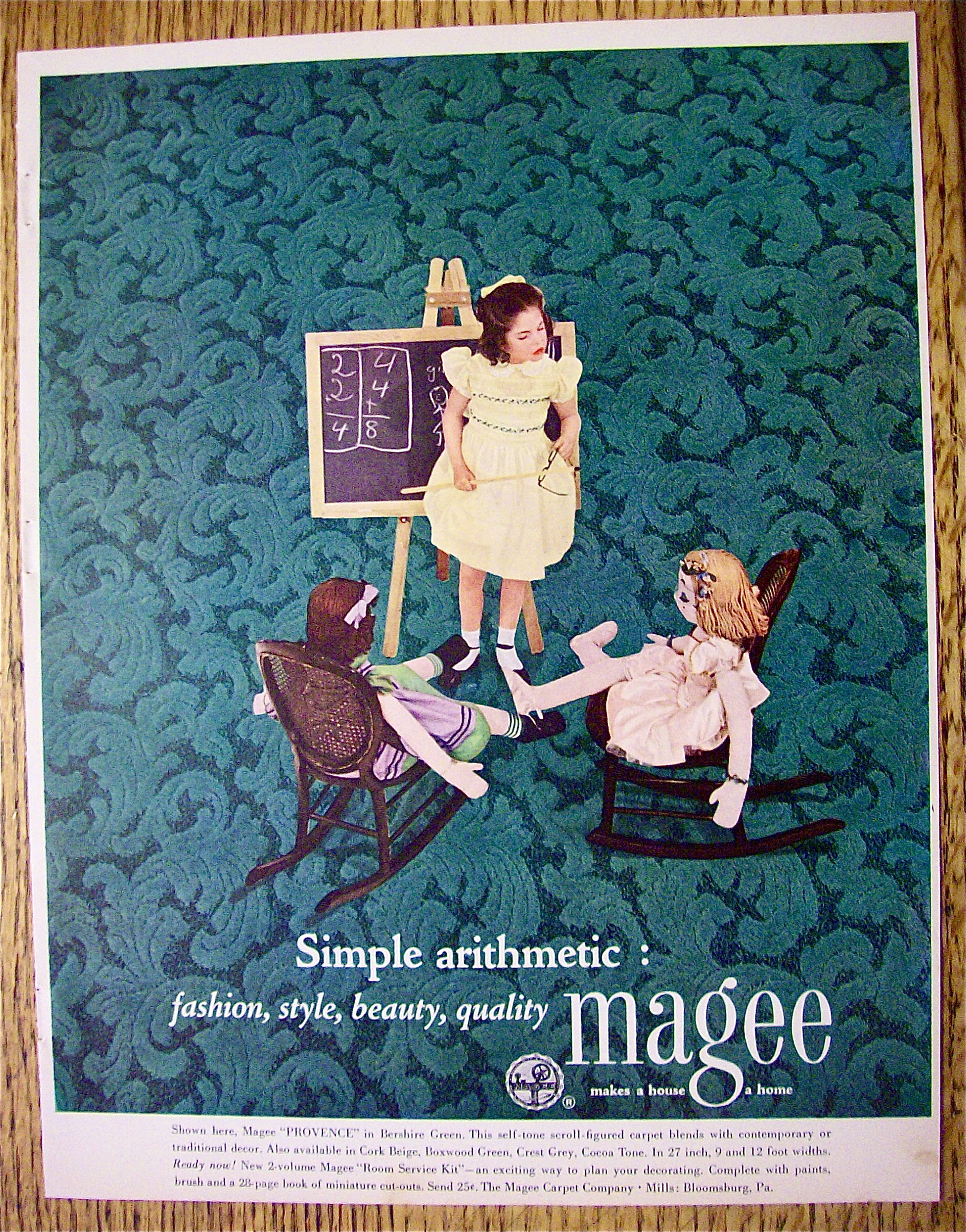 1952 Magee Carpets with Girl Playing with Her Dolls