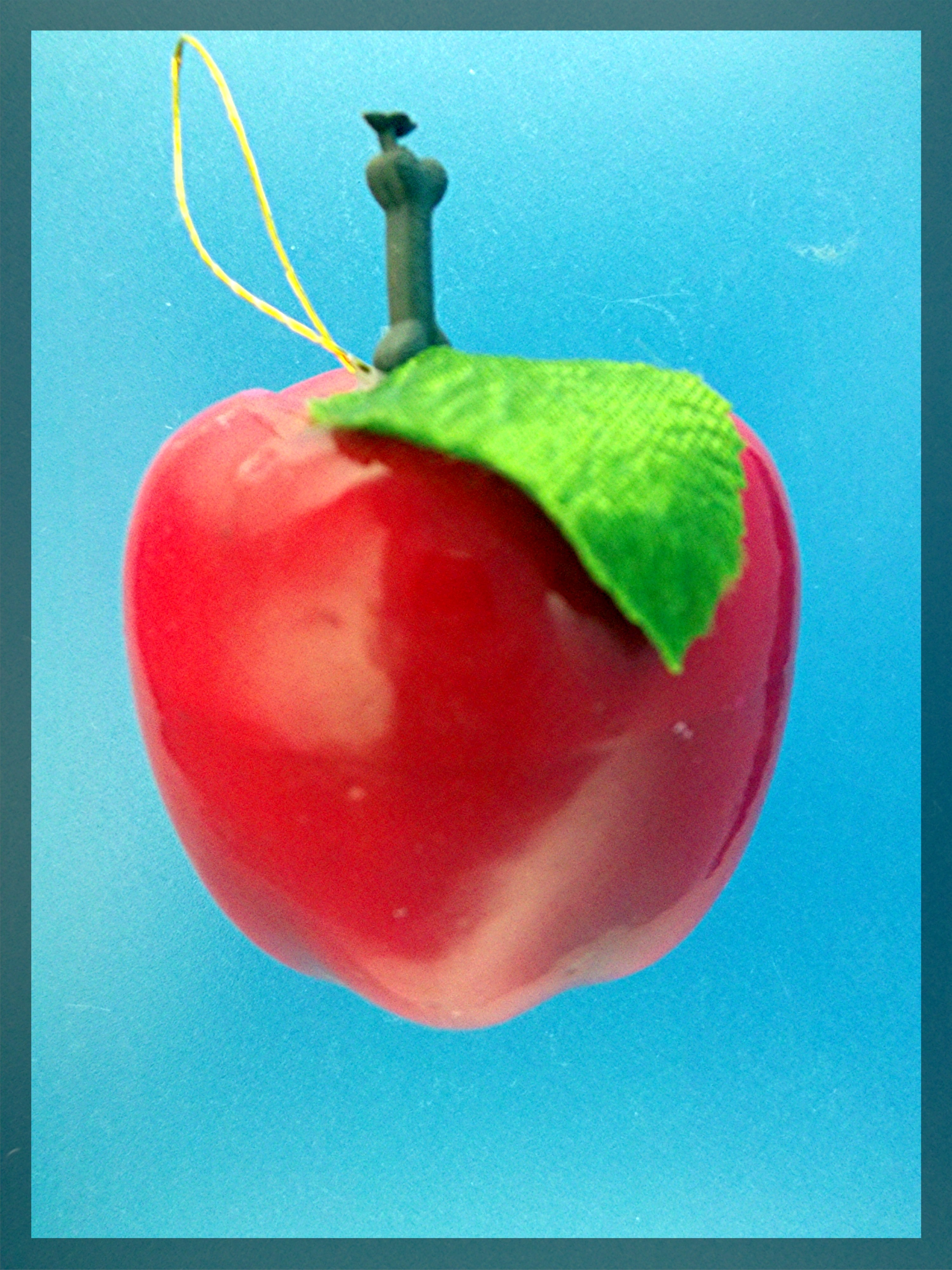 Pair of Apple Christmas tree ornaments