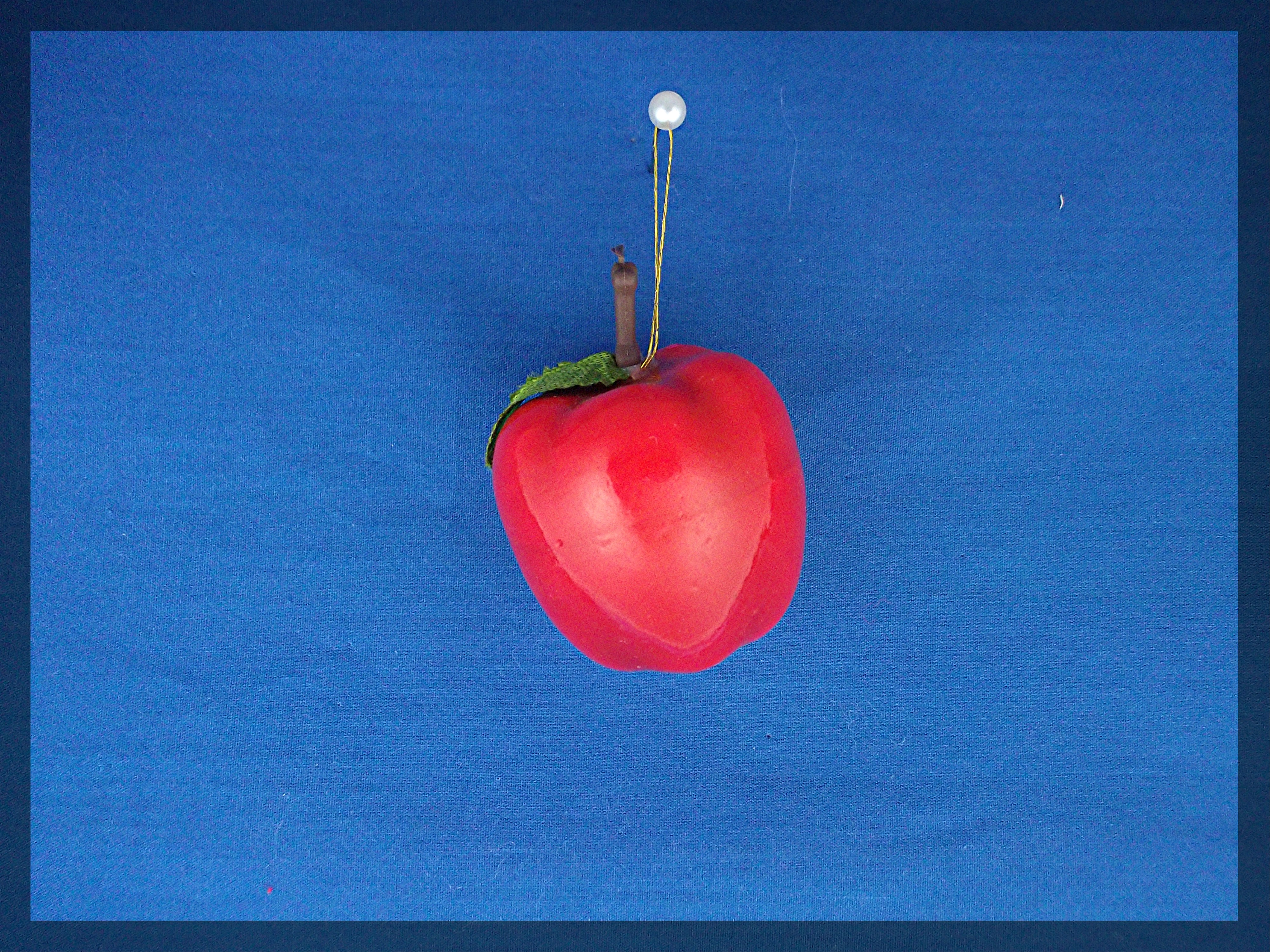 Pair of Apple Christmas tree ornaments