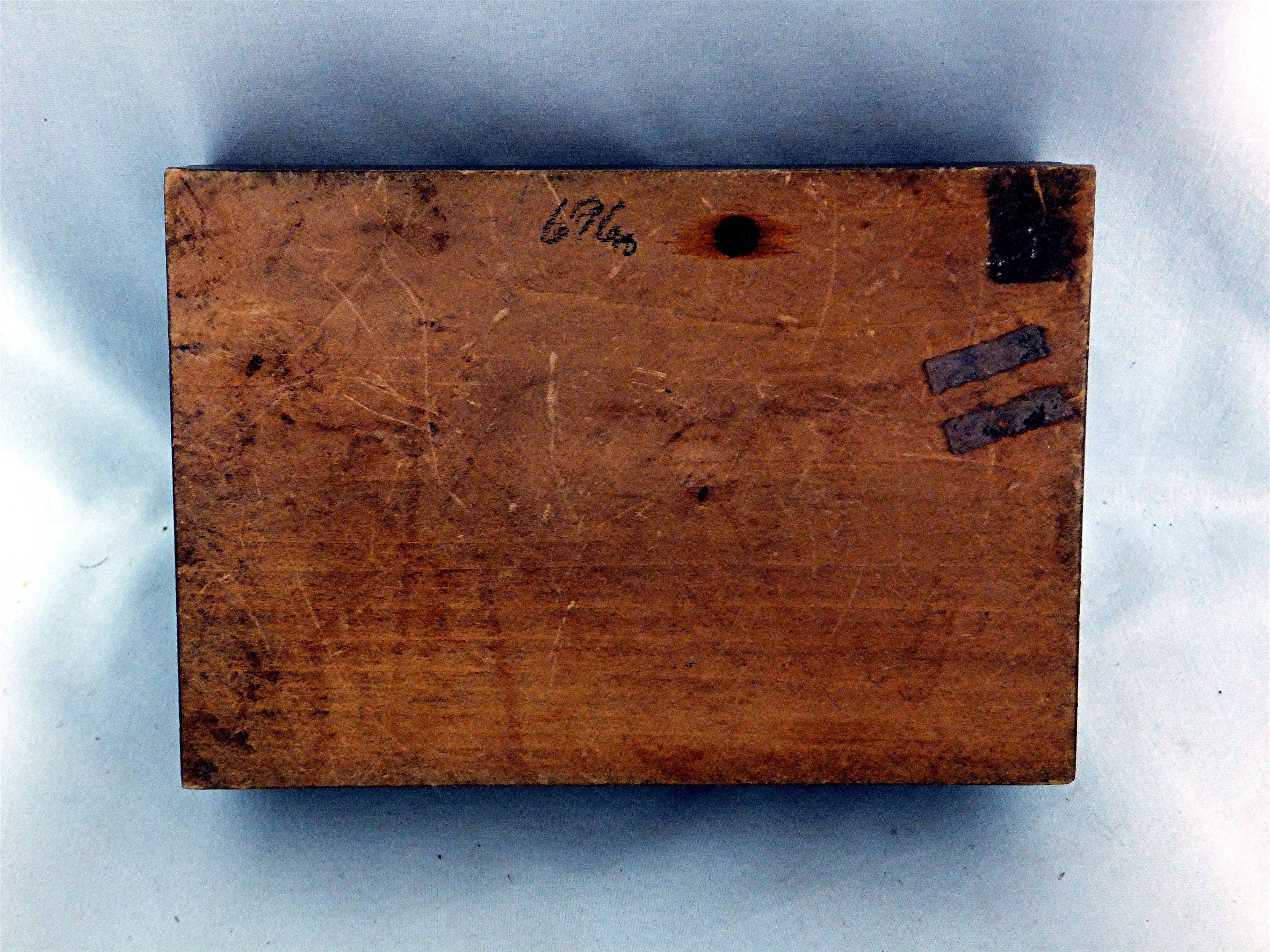 Carved wooden box hinged with brass inlay