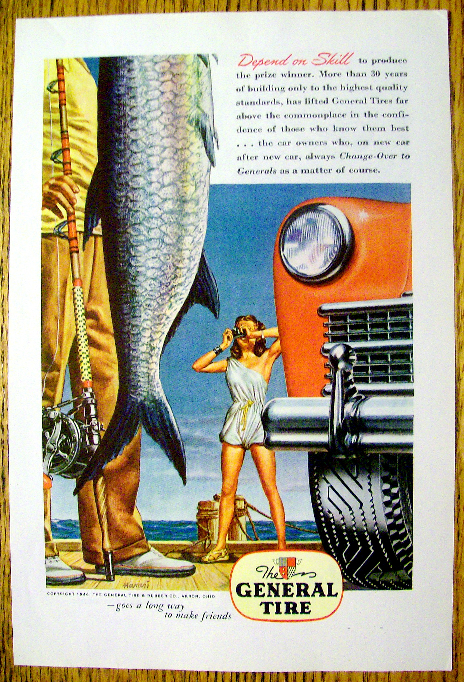 1946 General Tire with Woman Taking Picture Of A Man