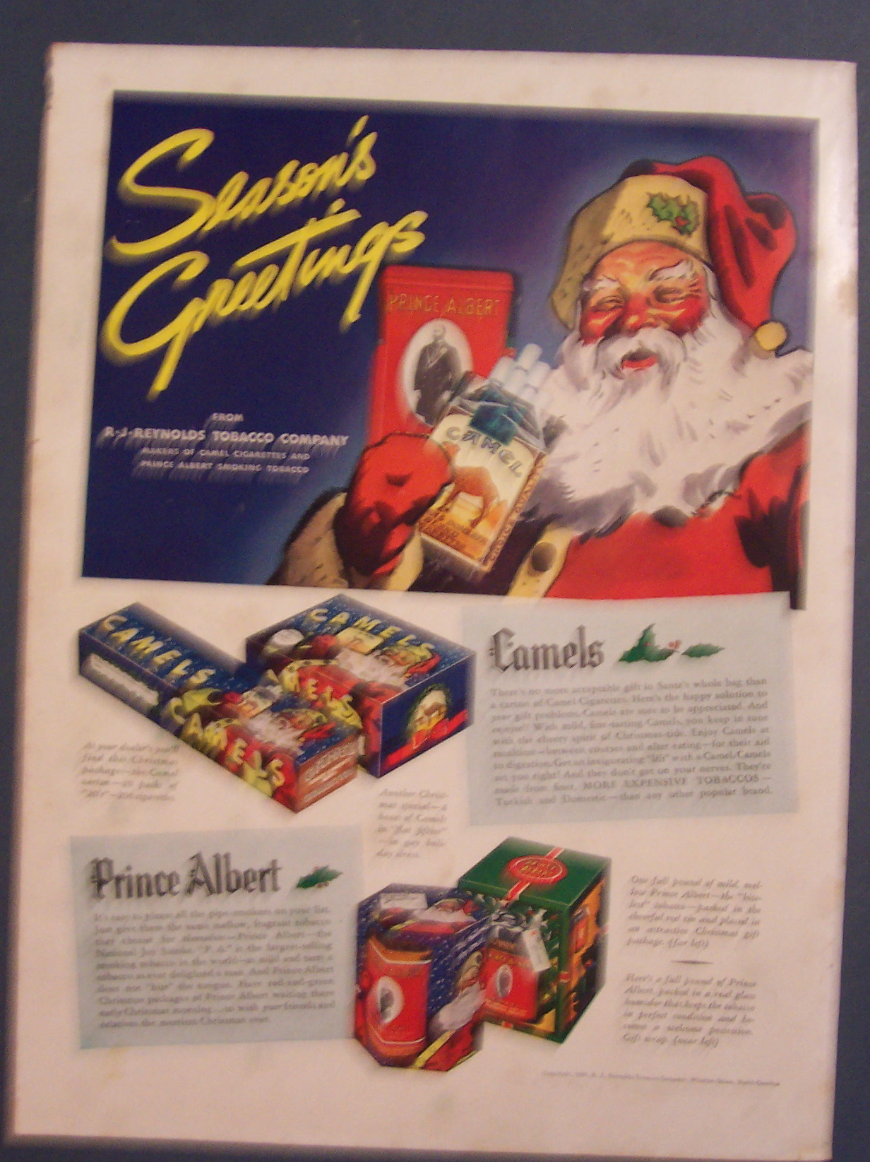 1936 Camel Cigarettes with Santa Holding Cigarettes