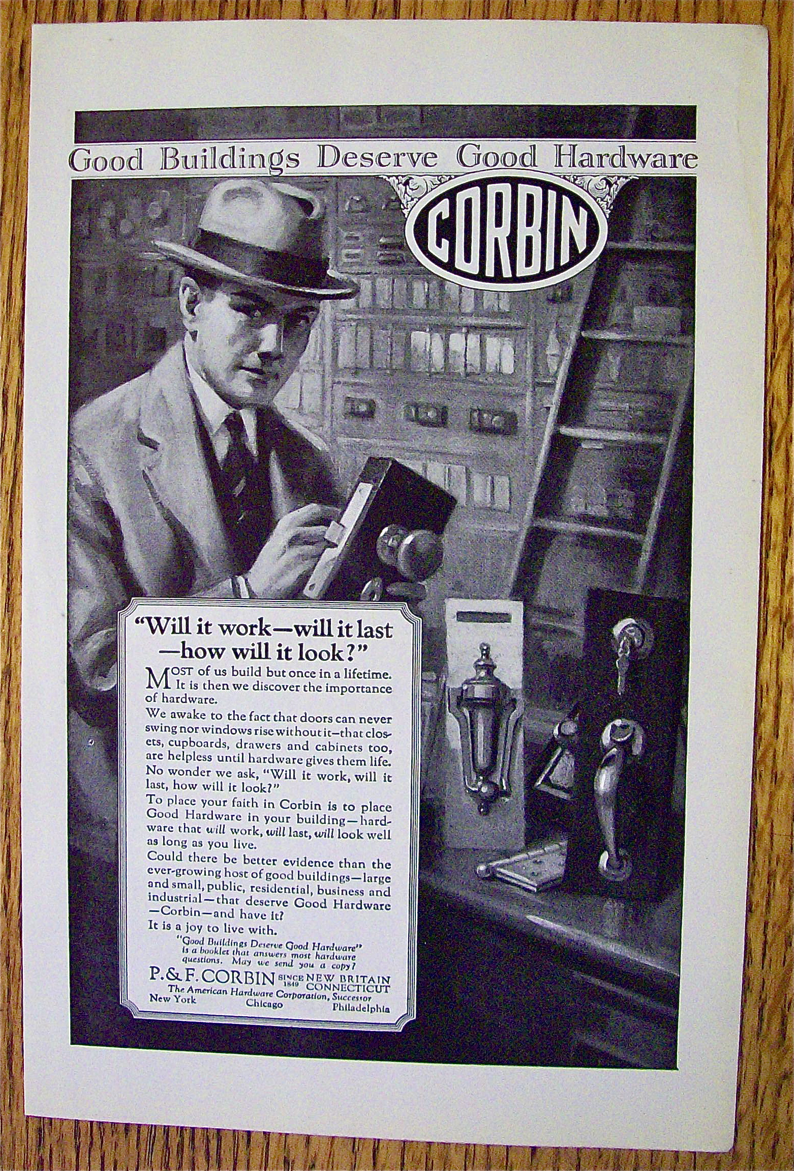 1925 Corbin Hardware with Man Looking At Door Locks