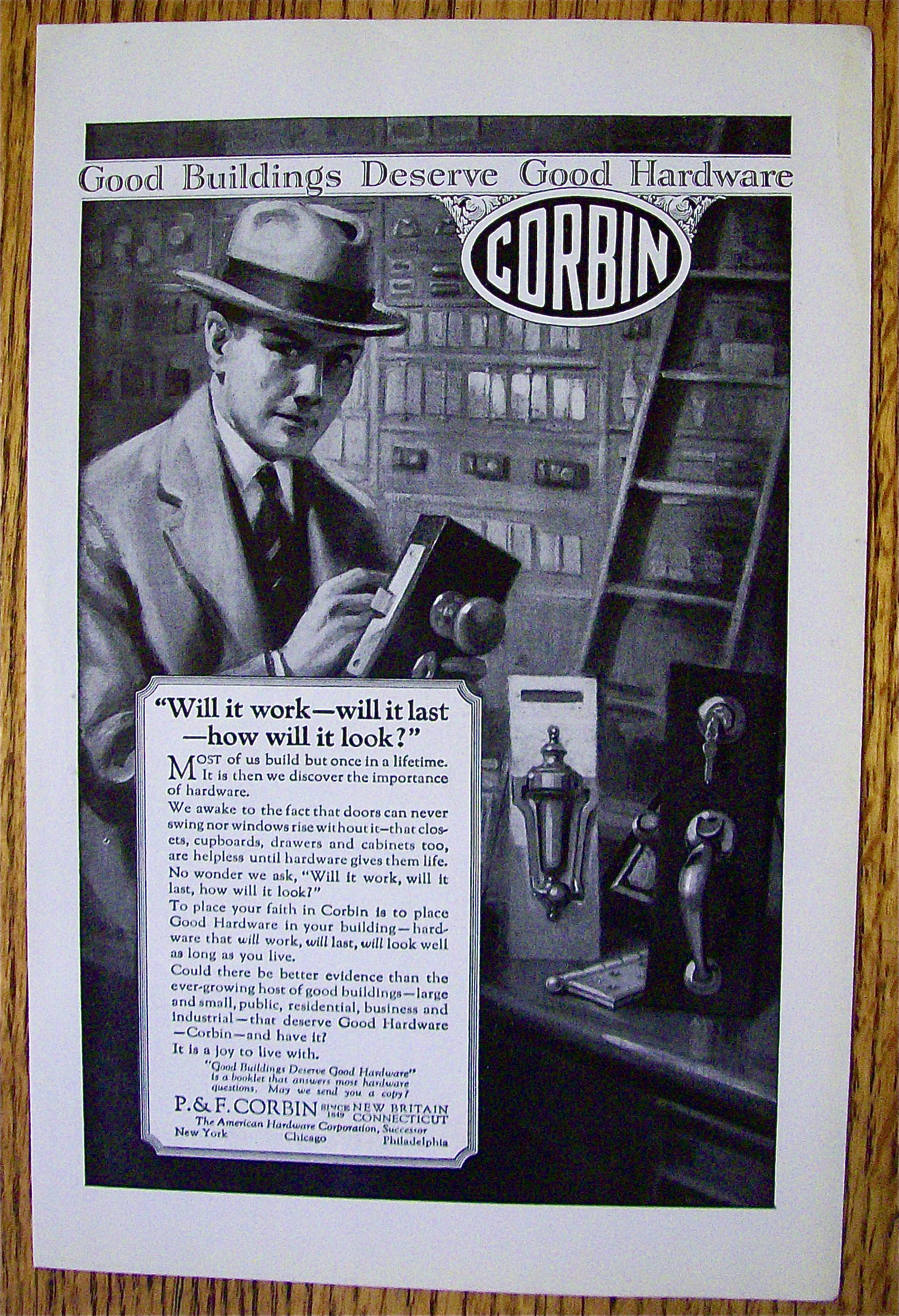 1925 Corbin Hardware with Man Looking At Door Locks