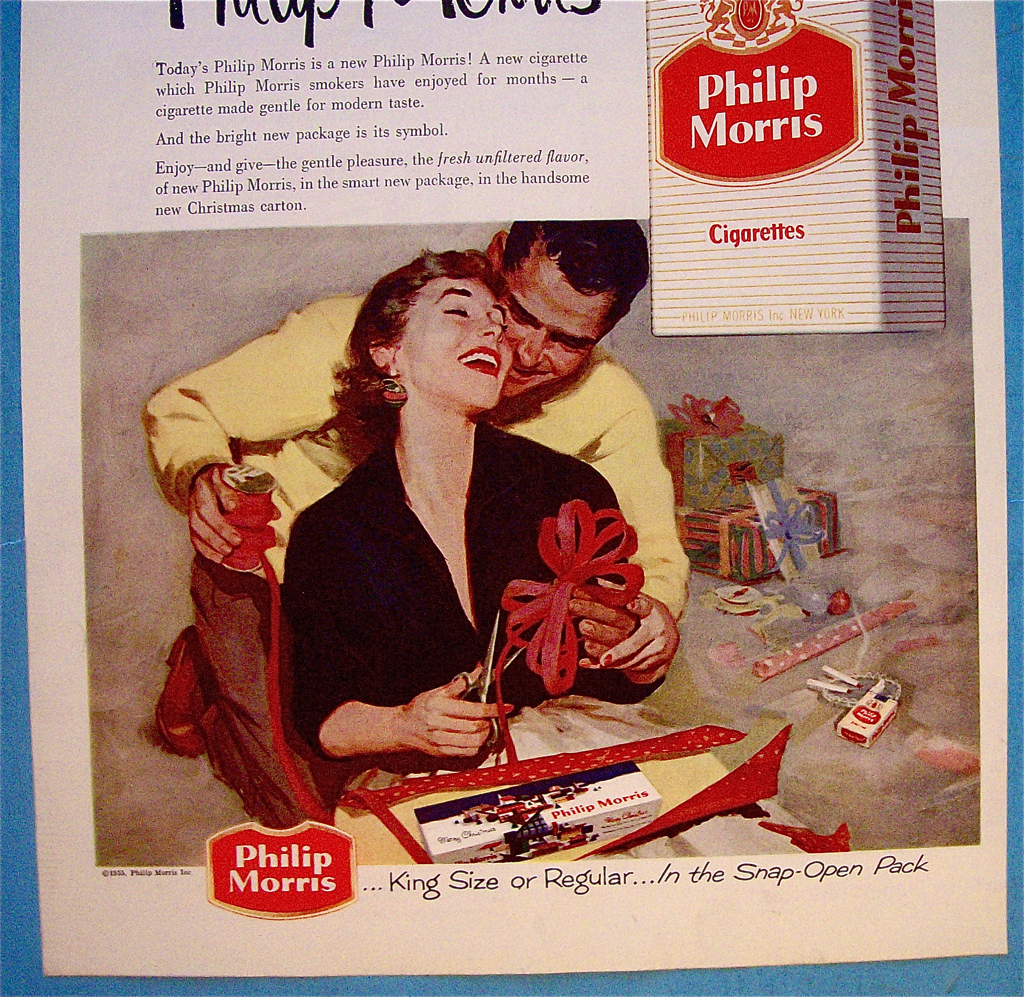 1955 Philip Morris with Woman Wrapping Gift