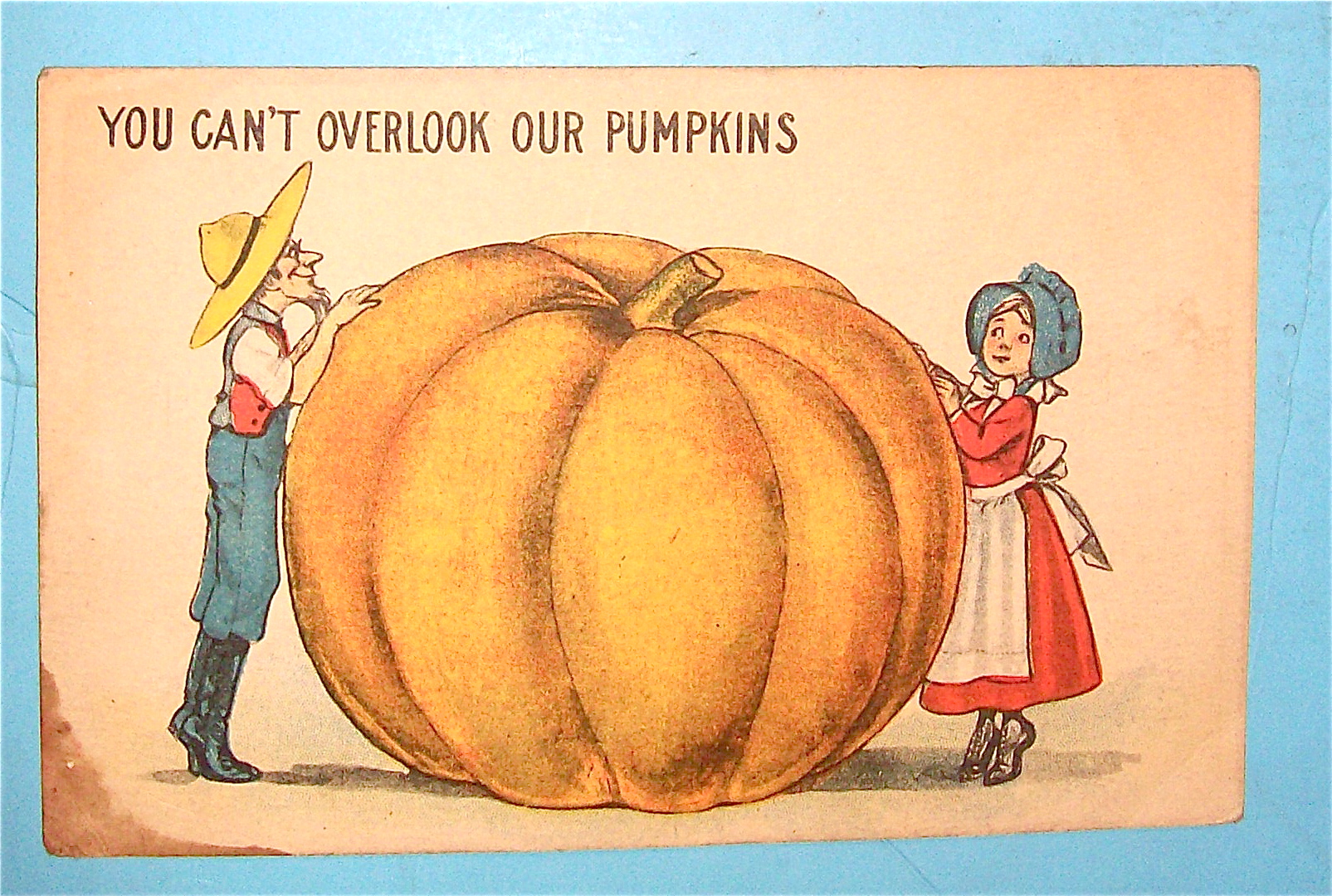 Big Pumpkin Between Man & Woman Postcard