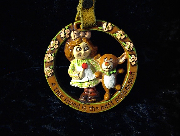 Christmas Tree Ornament on a Leather Strap.