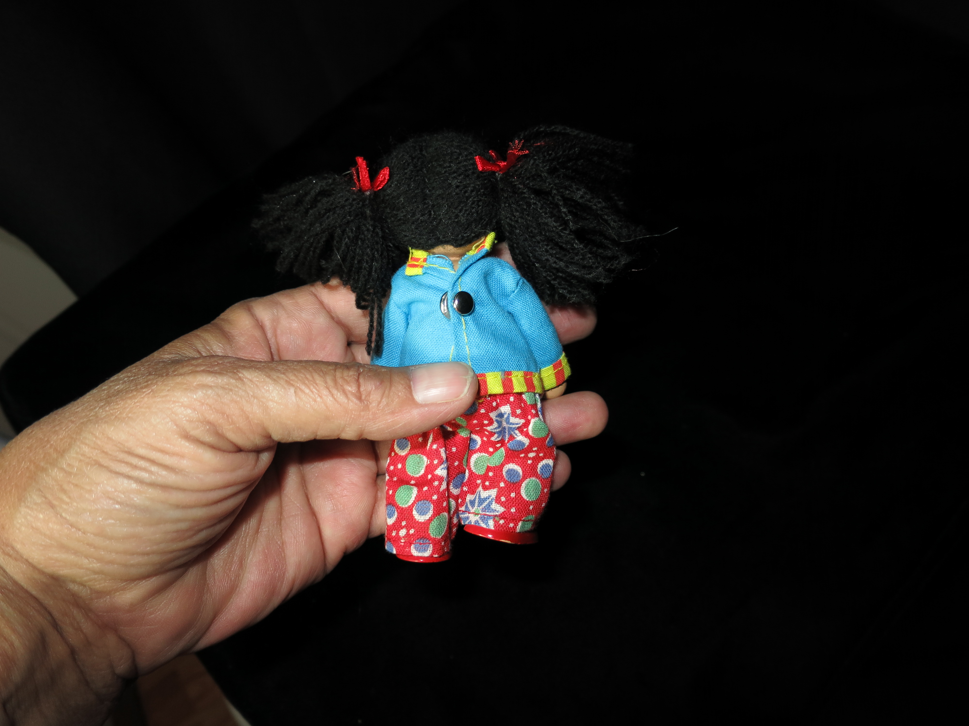 Melissa and Doug 4 inch Wooden Doll best guess