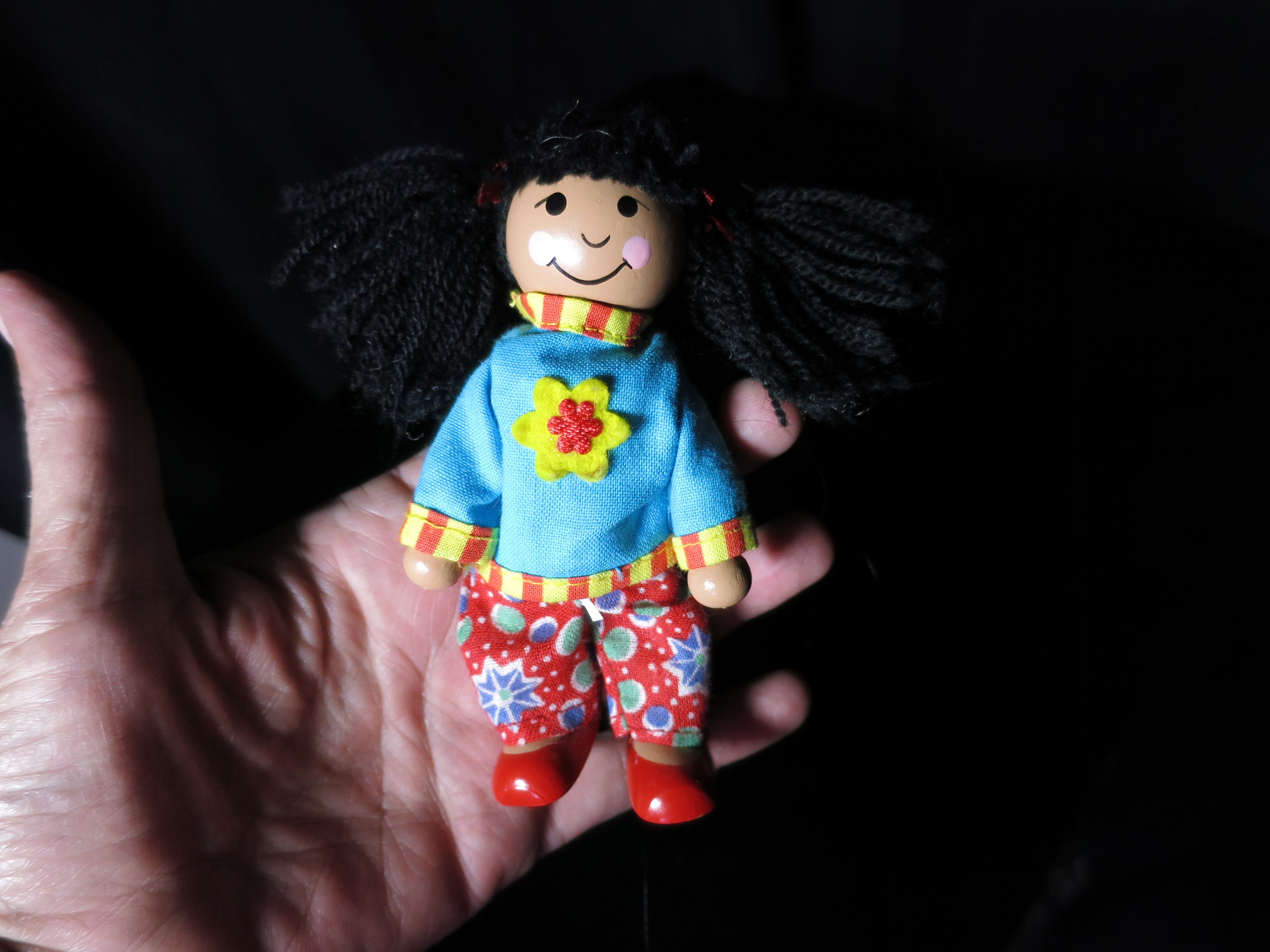 Melissa and Doug 4 inch Wooden Doll best guess