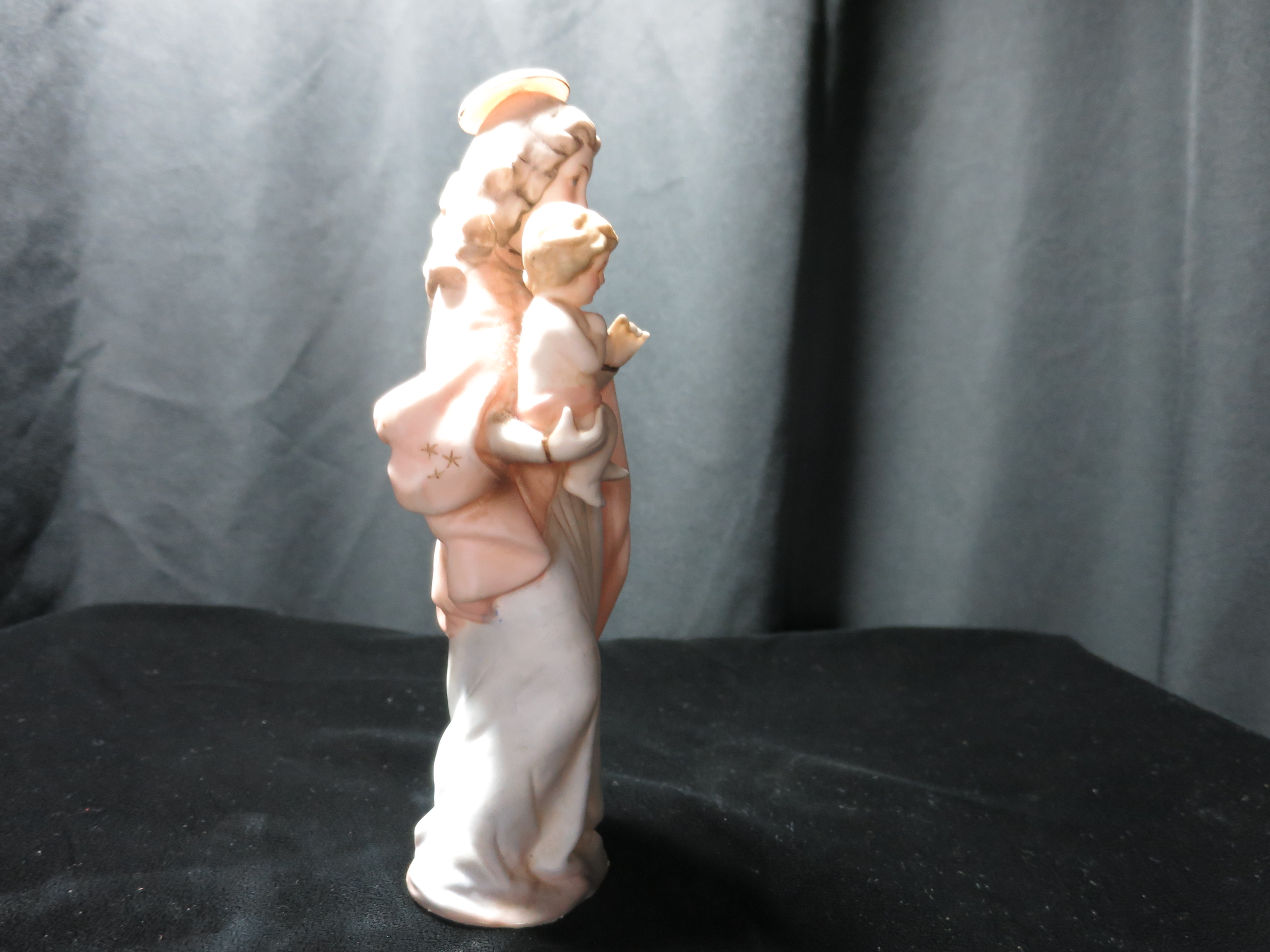 Porcelain Virgin Mother Mary holding Jesus Statue