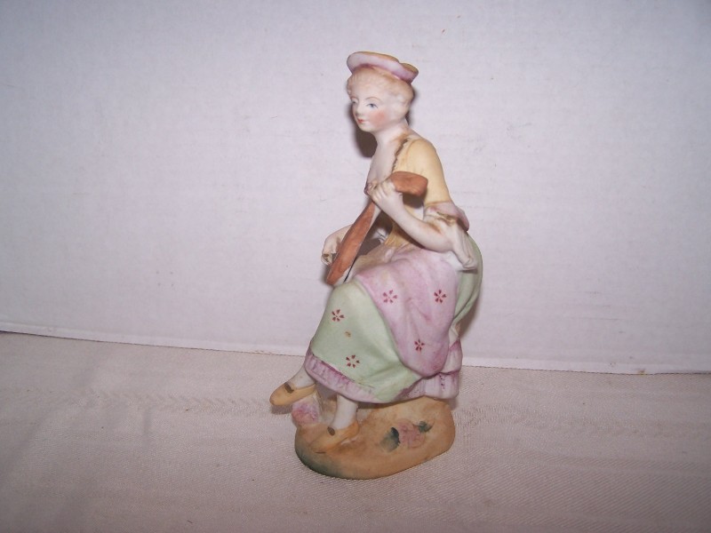 Bisque Lady Figurine Playing Mandolin