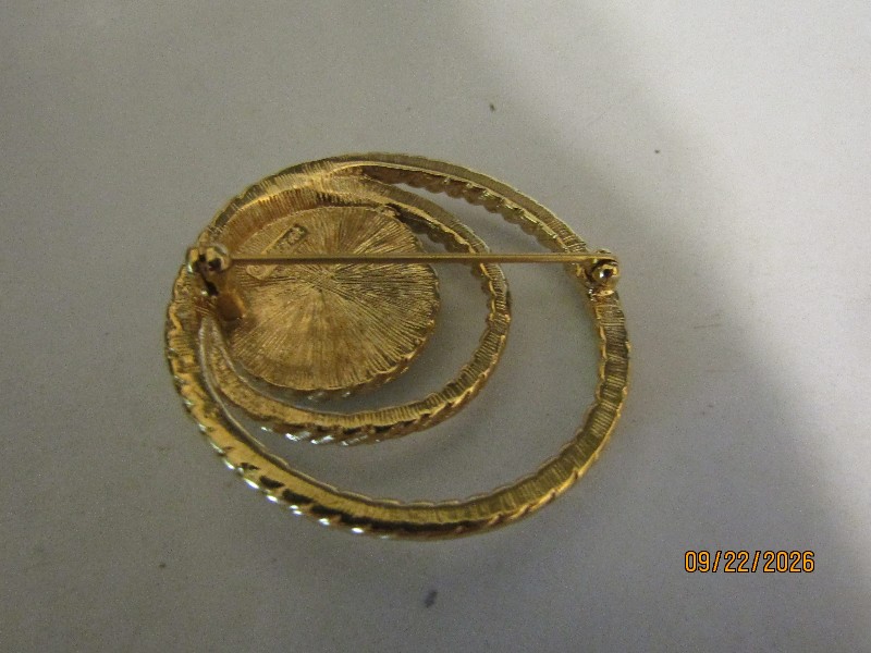 Vintage Monet Gold-Tone Textured Spiral Brooch with Faux Pearl Center