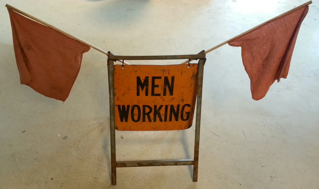 Men Working Sign
