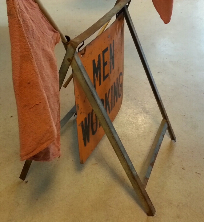 Men Working Sign