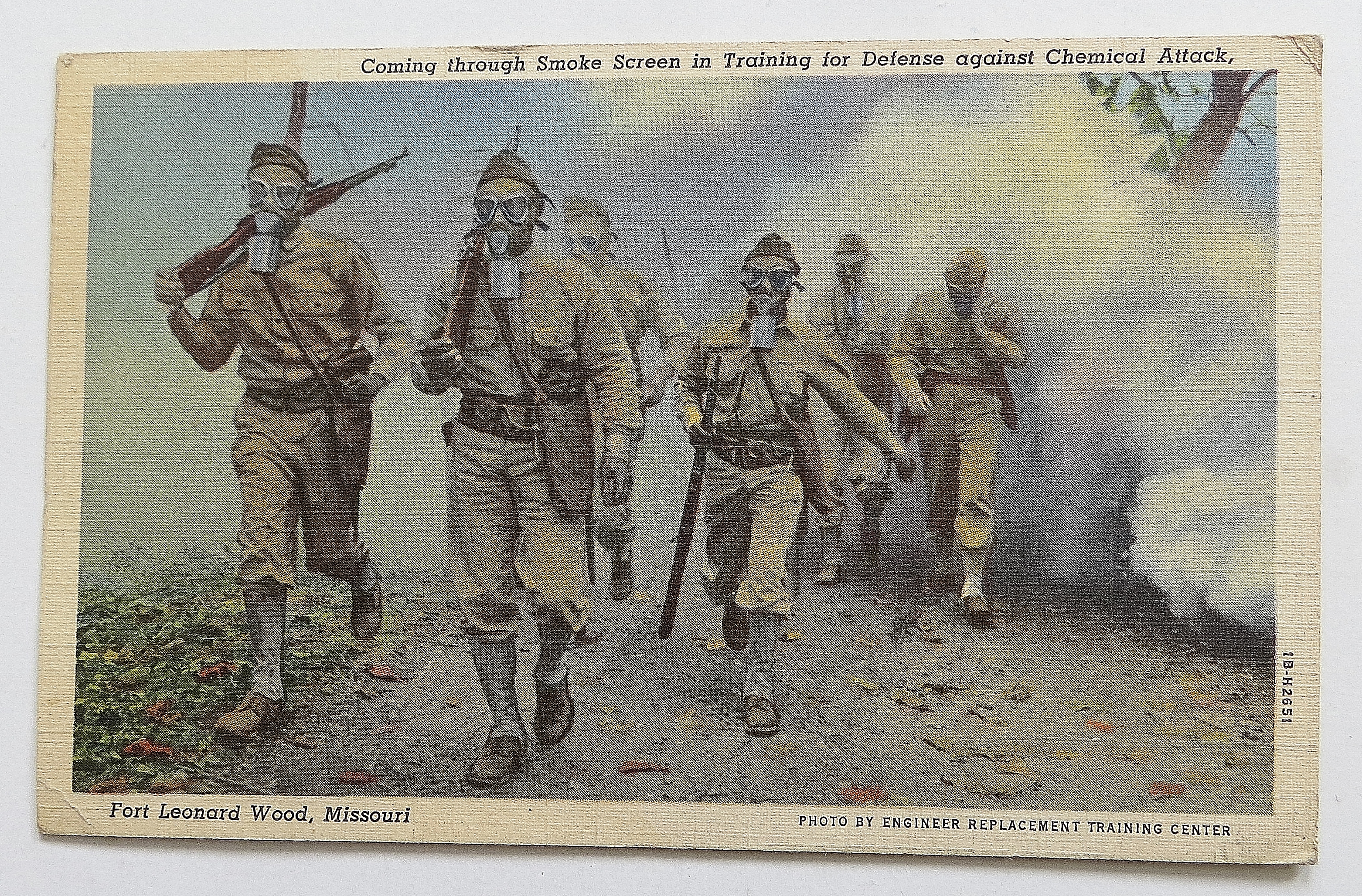 Men Coming Through Smoke Screen In Training Defense