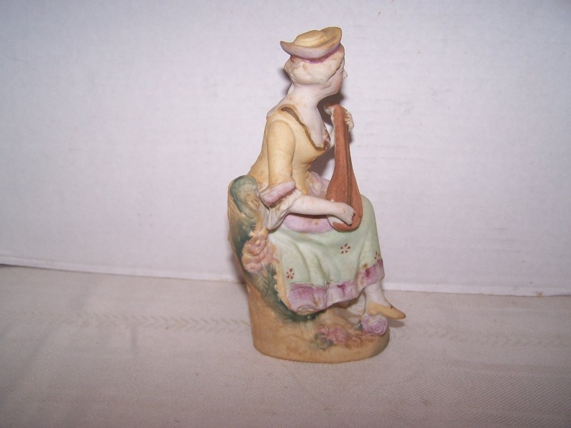 Bisque Lady Figurine Playing Mandolin