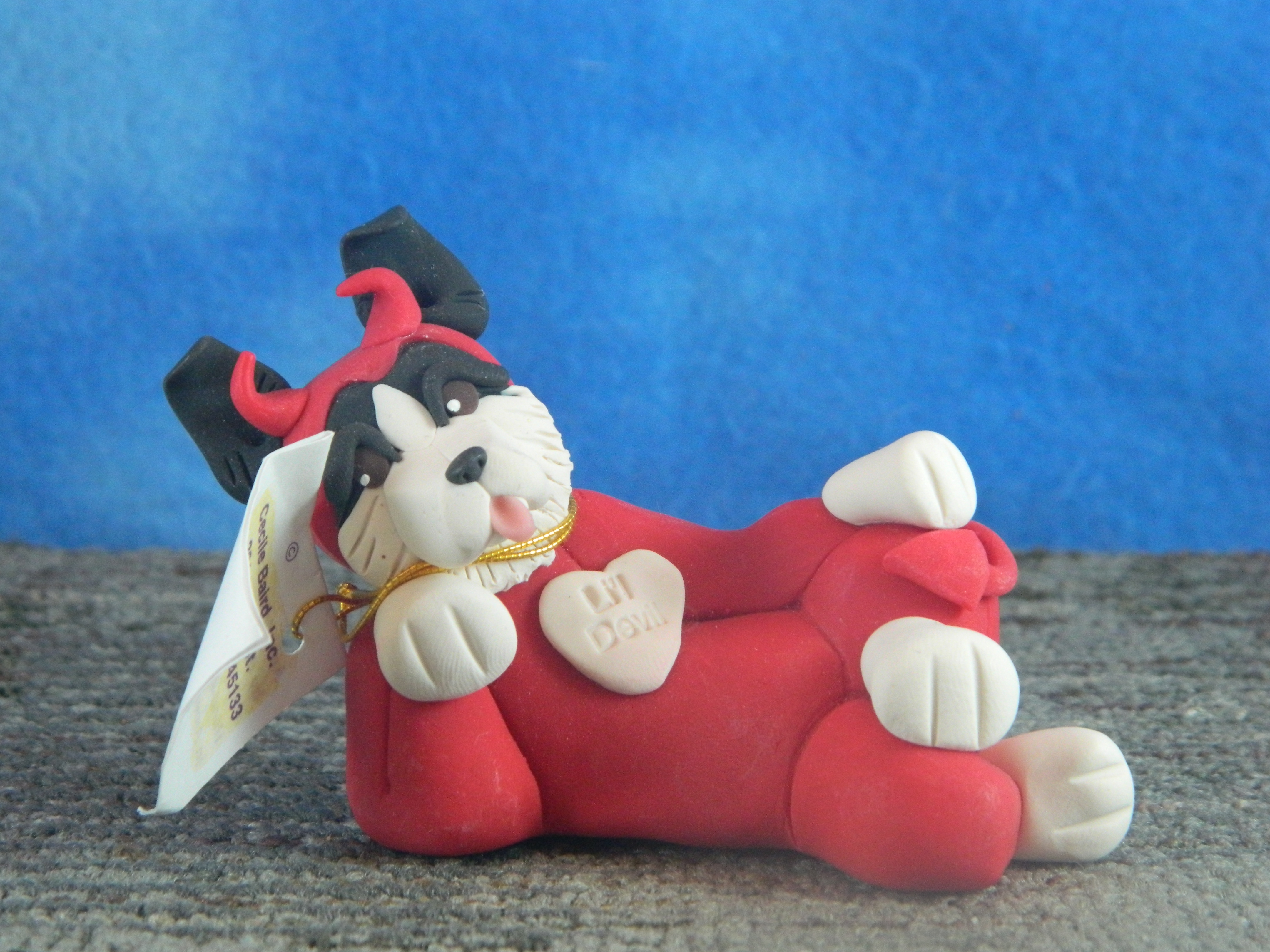Cecile Border Collie dressed in a Devil suit