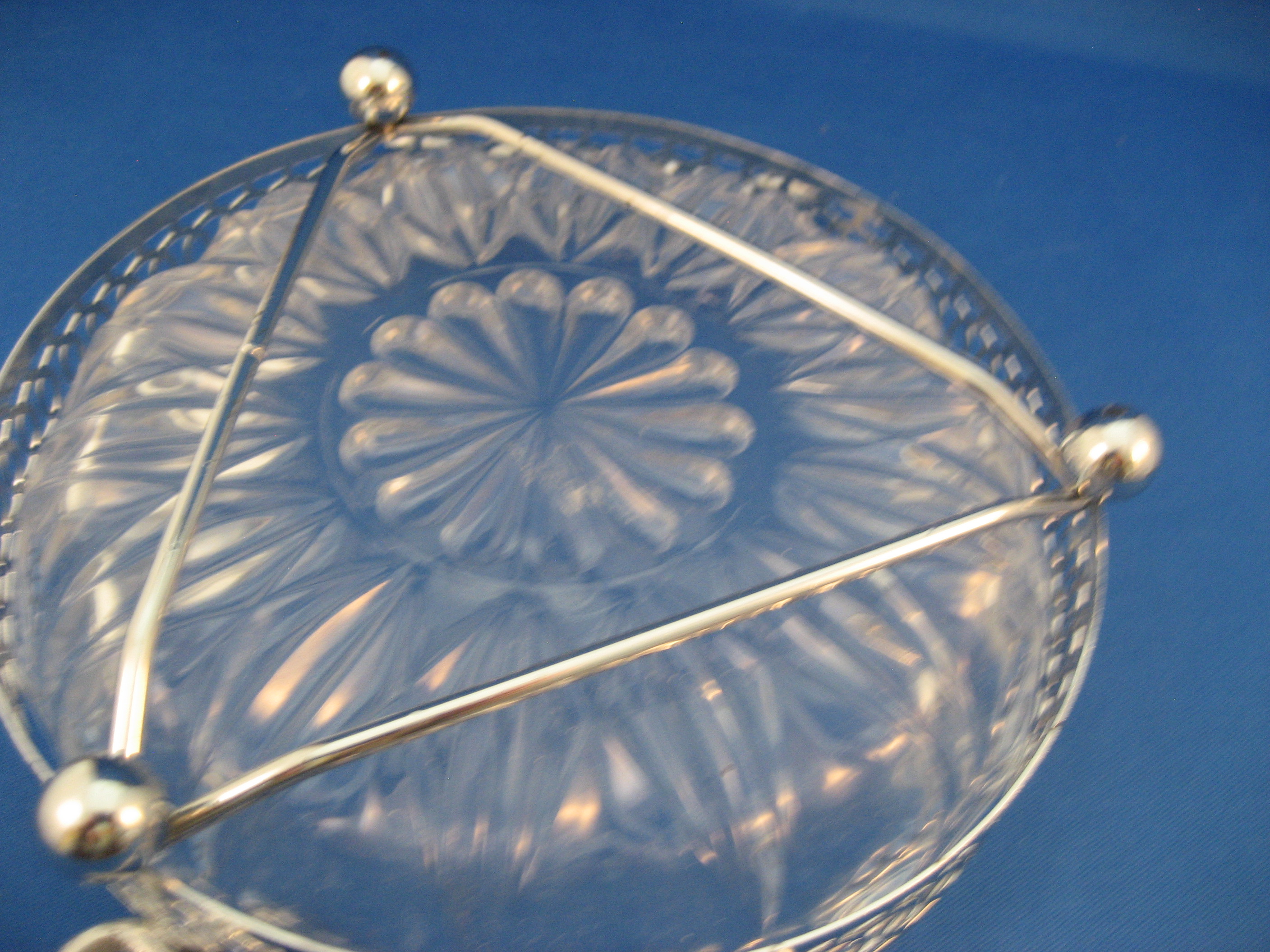Glass and Silver Dish with Fork and Spoon