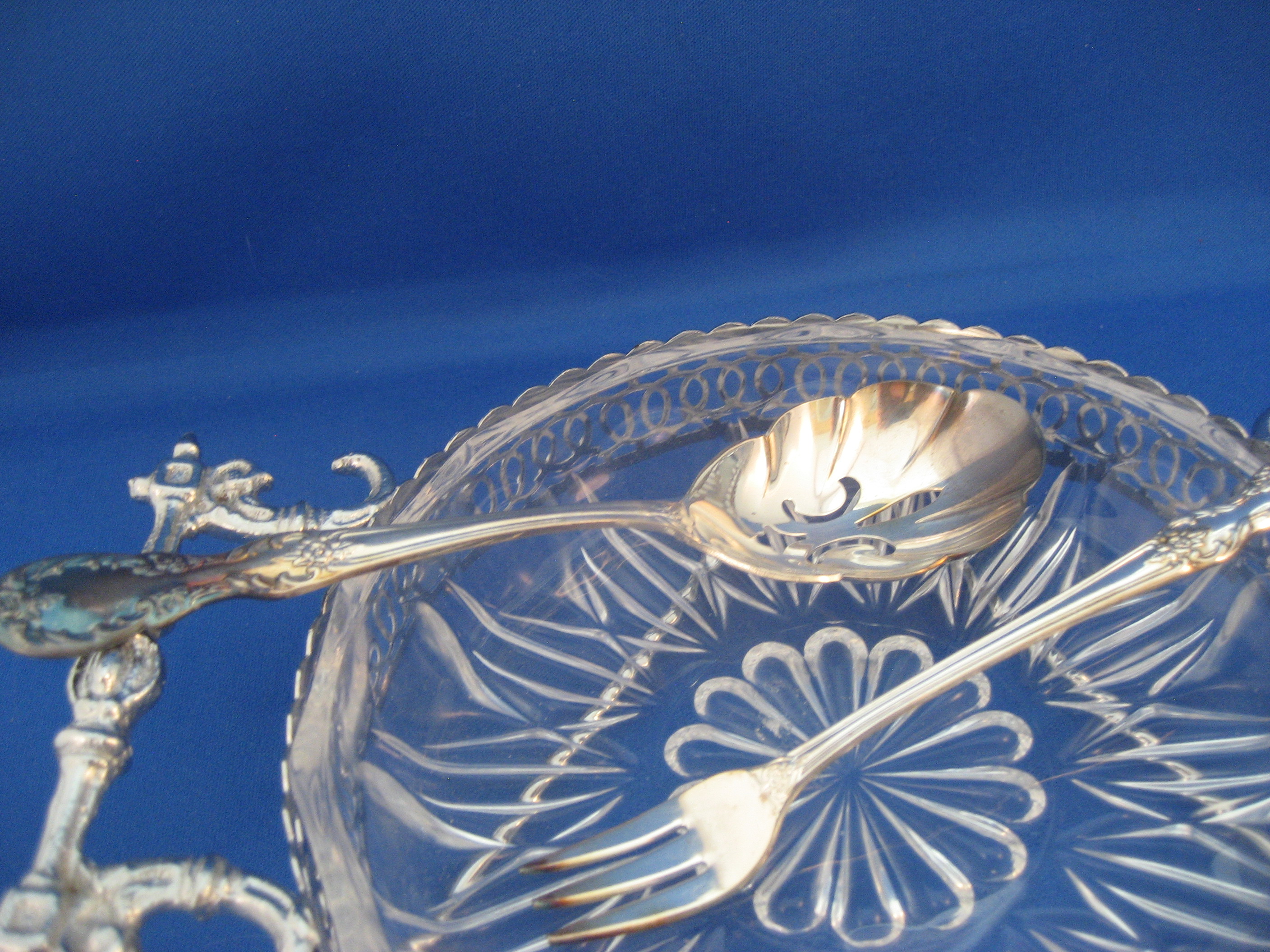 Glass and Silver Dish with Fork and Spoon