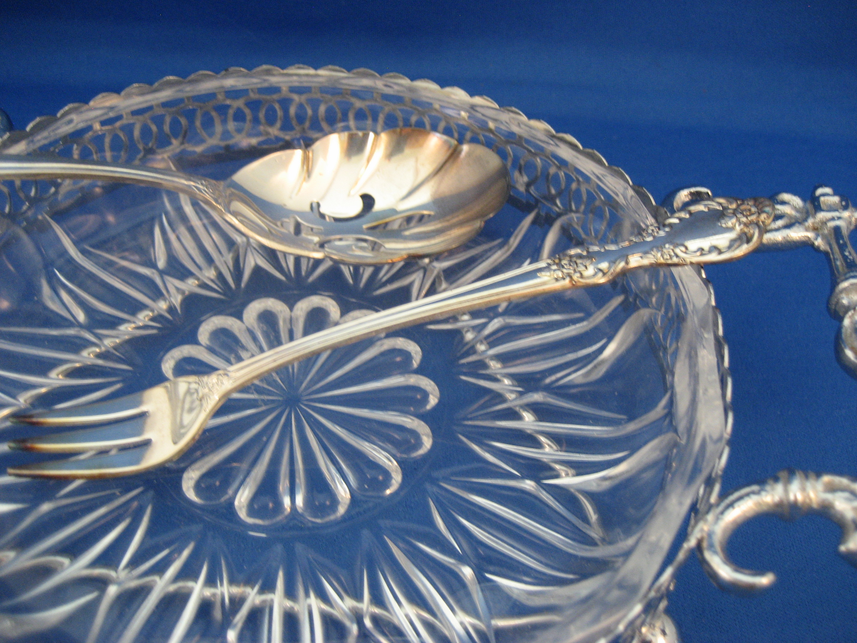 Glass and Silver Dish with Fork and Spoon