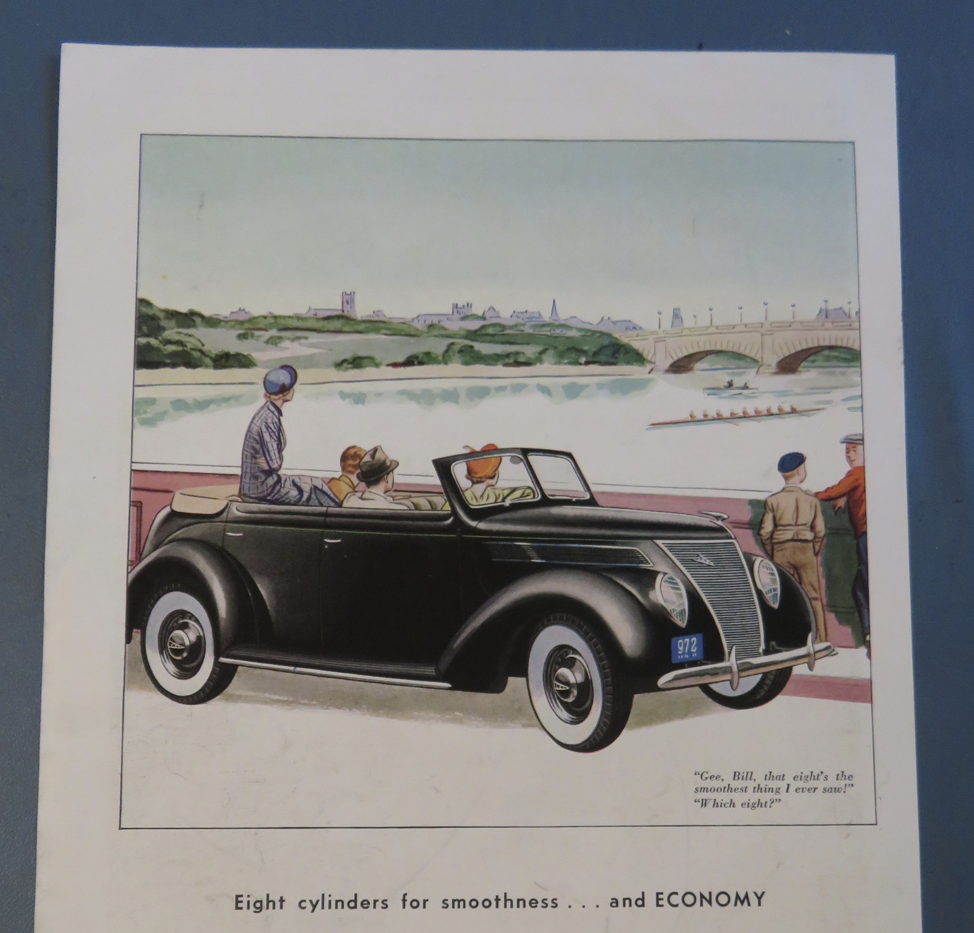 1937 Ford V-8 with Ford by The Water with People in Car