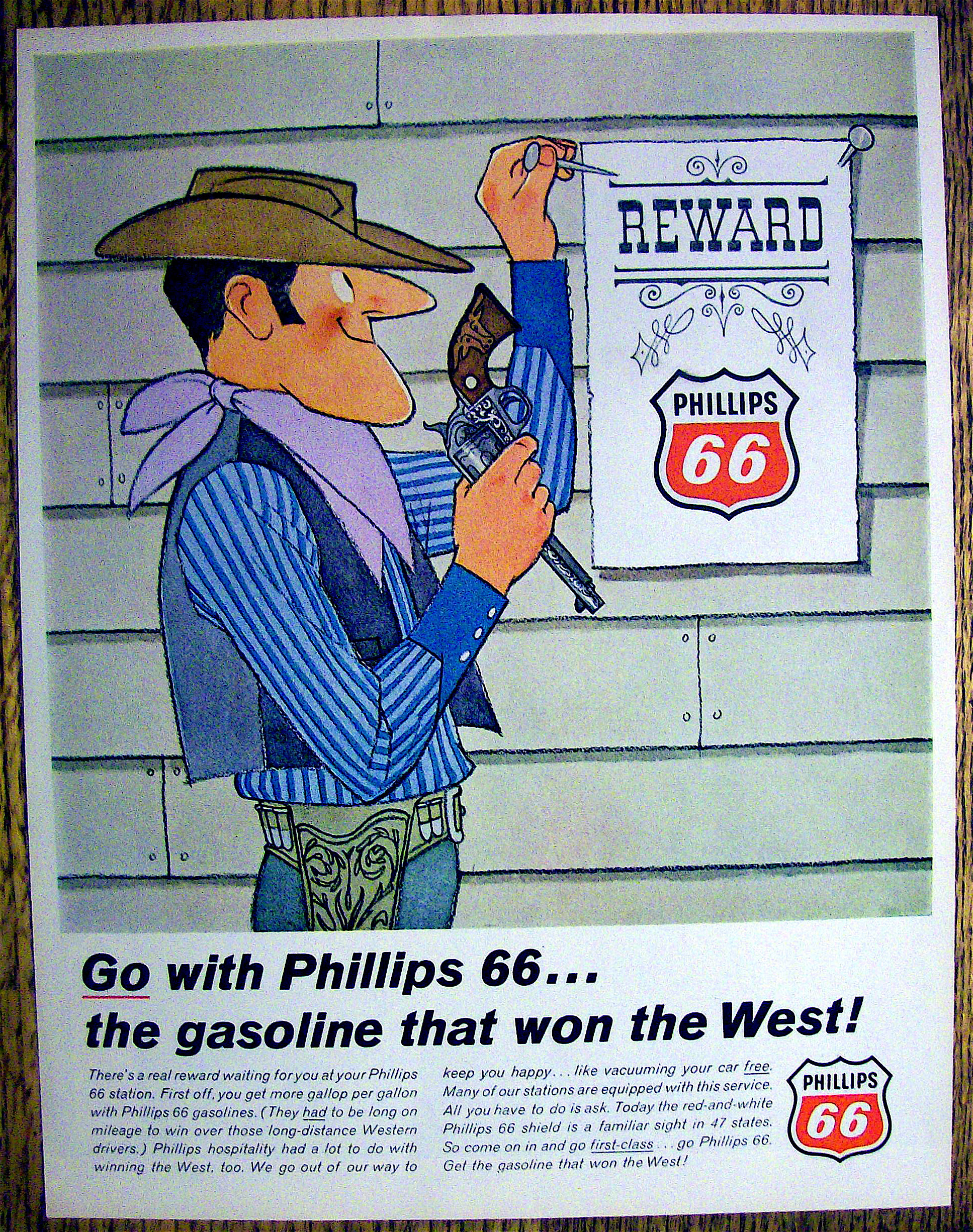 1966 Phillips 66 with Cowboy Hanging Reward Sign