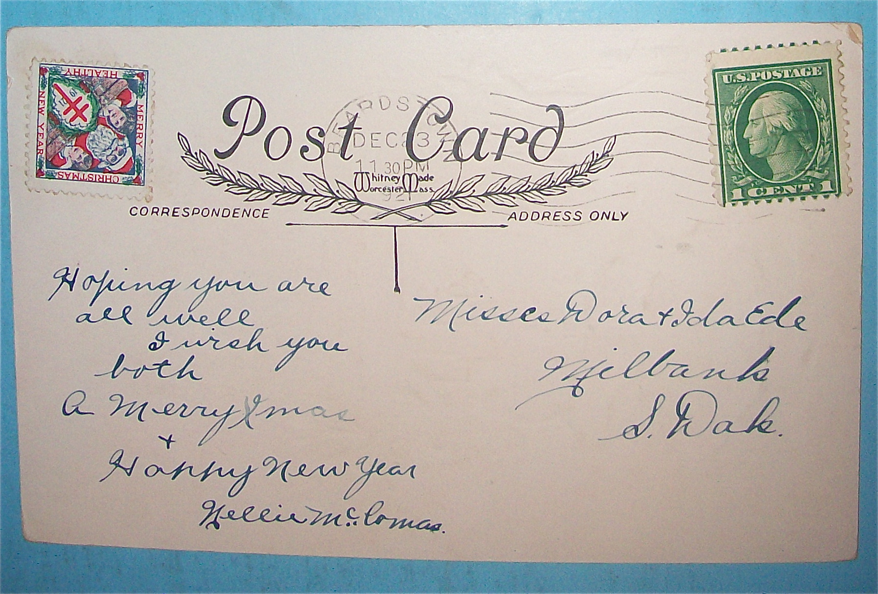 Christmas Greetings Postcard w/Girl Sitting in Tree
