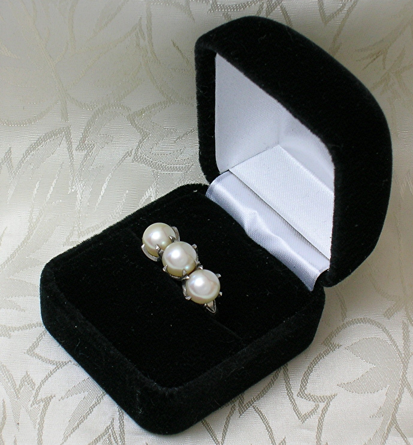 Magnificent 3 Pearl Palladium Claw Set Ring . . . .