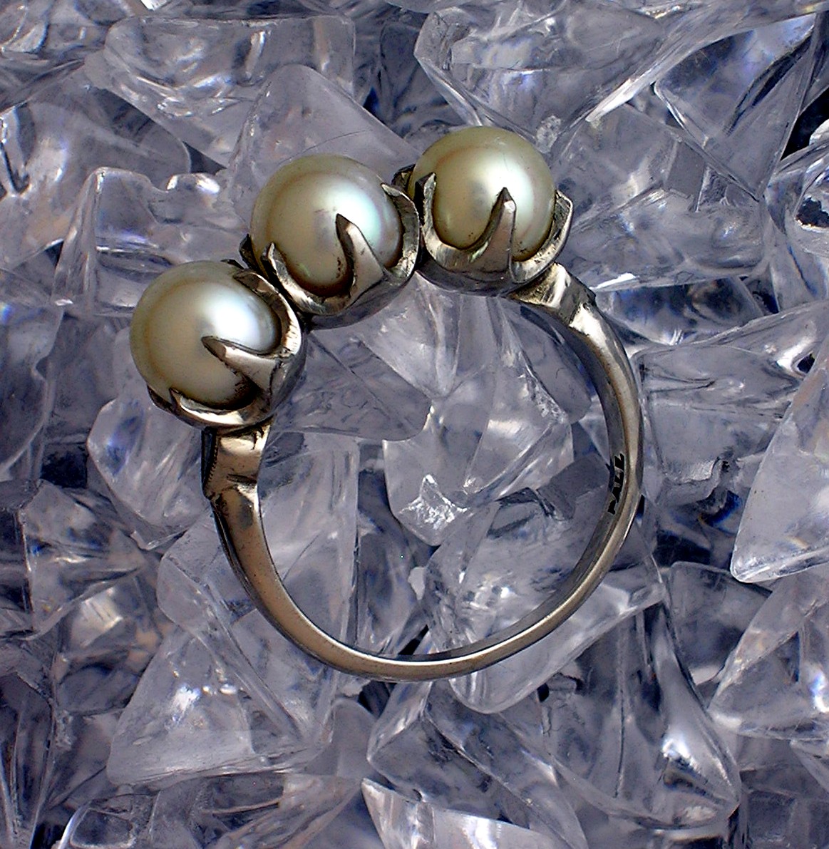 Magnificent 3 Pearl Palladium Claw Set Ring . . . .