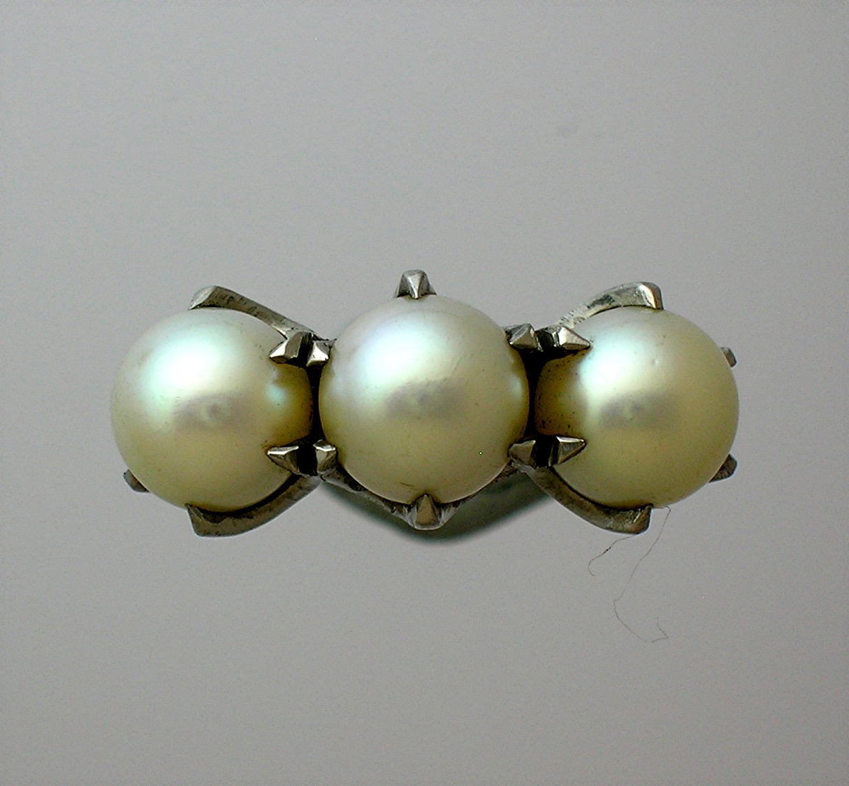 Magnificent 3 Pearl Palladium Claw Set Ring . . . .