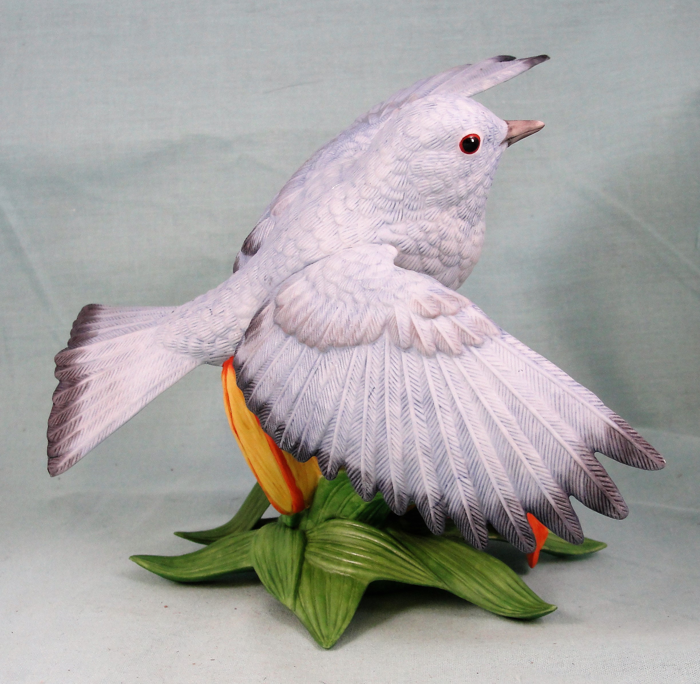 Lenox Mountain Bluebird in Flight Over a Lily