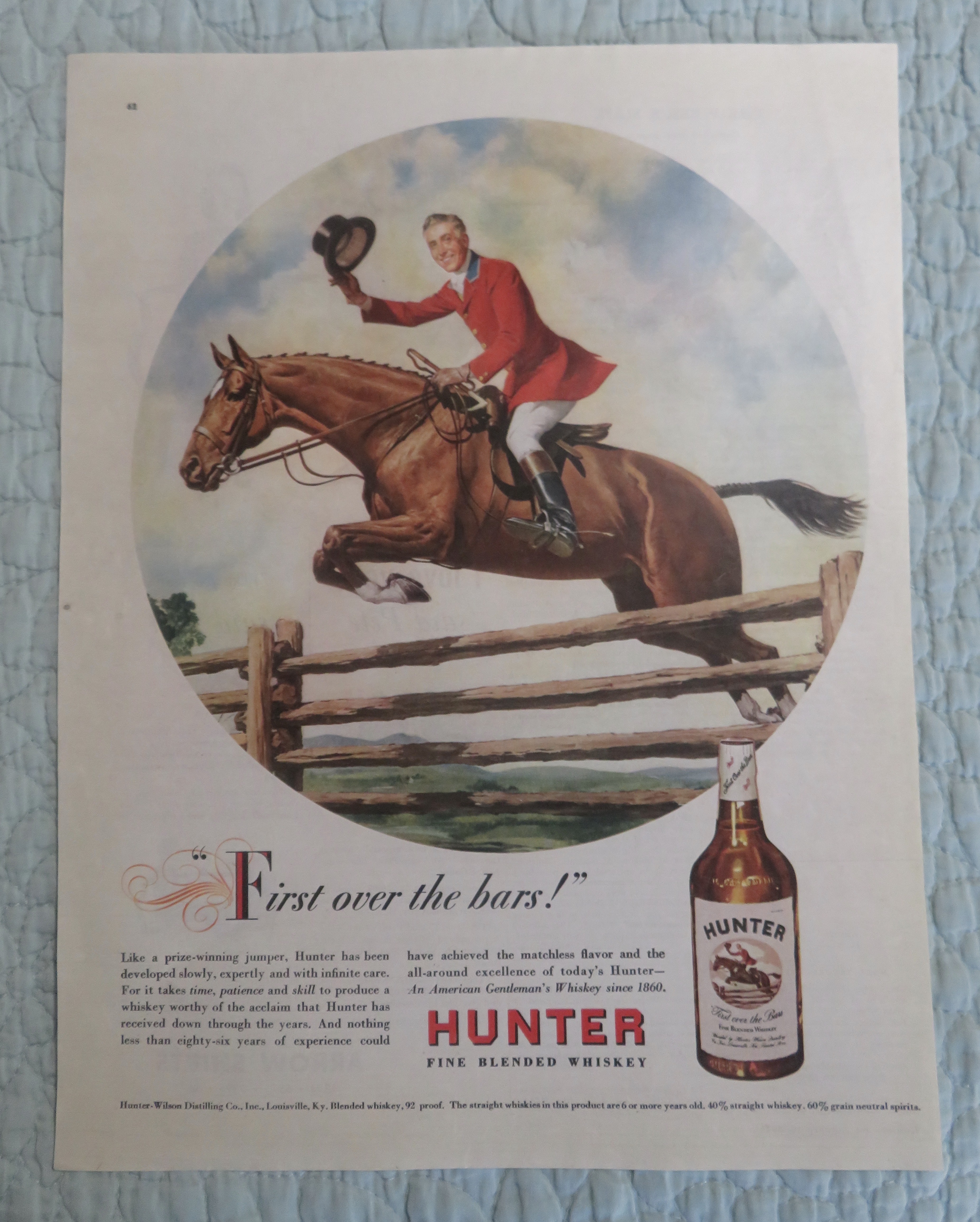 1947 Hunter Whiskey with Man Riding on a Horse